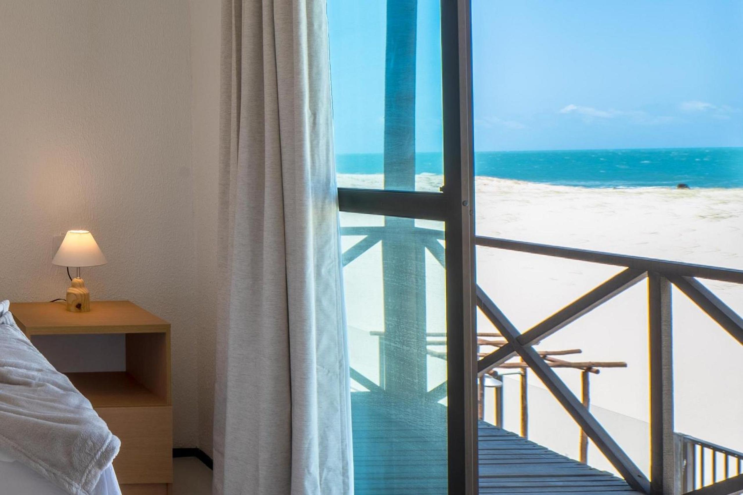 Beachfront Duplex Foot in the Sand By Carpediem