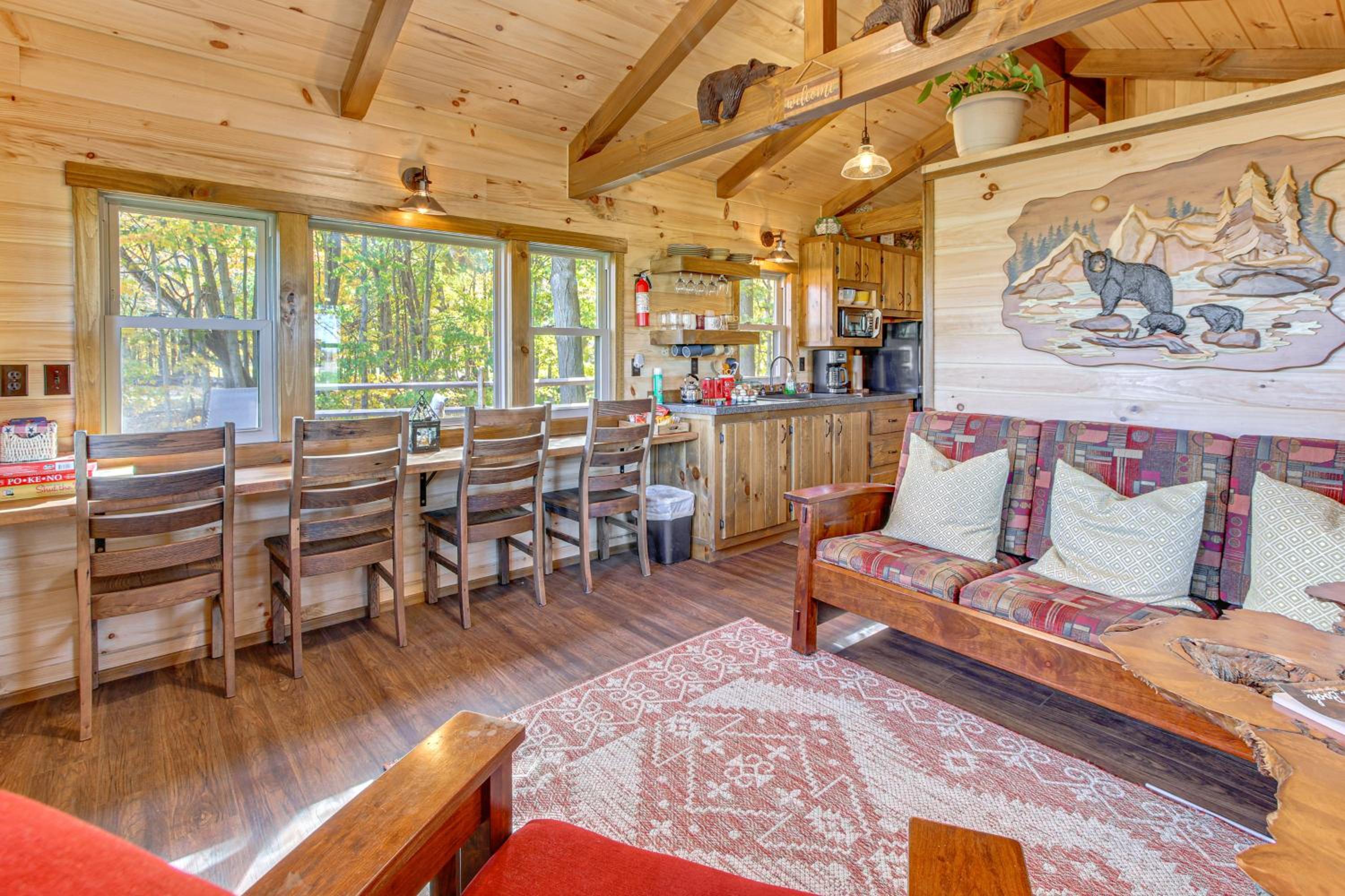 Outdoor Oasis with Fire Pit and Dock Galion Log Cabin