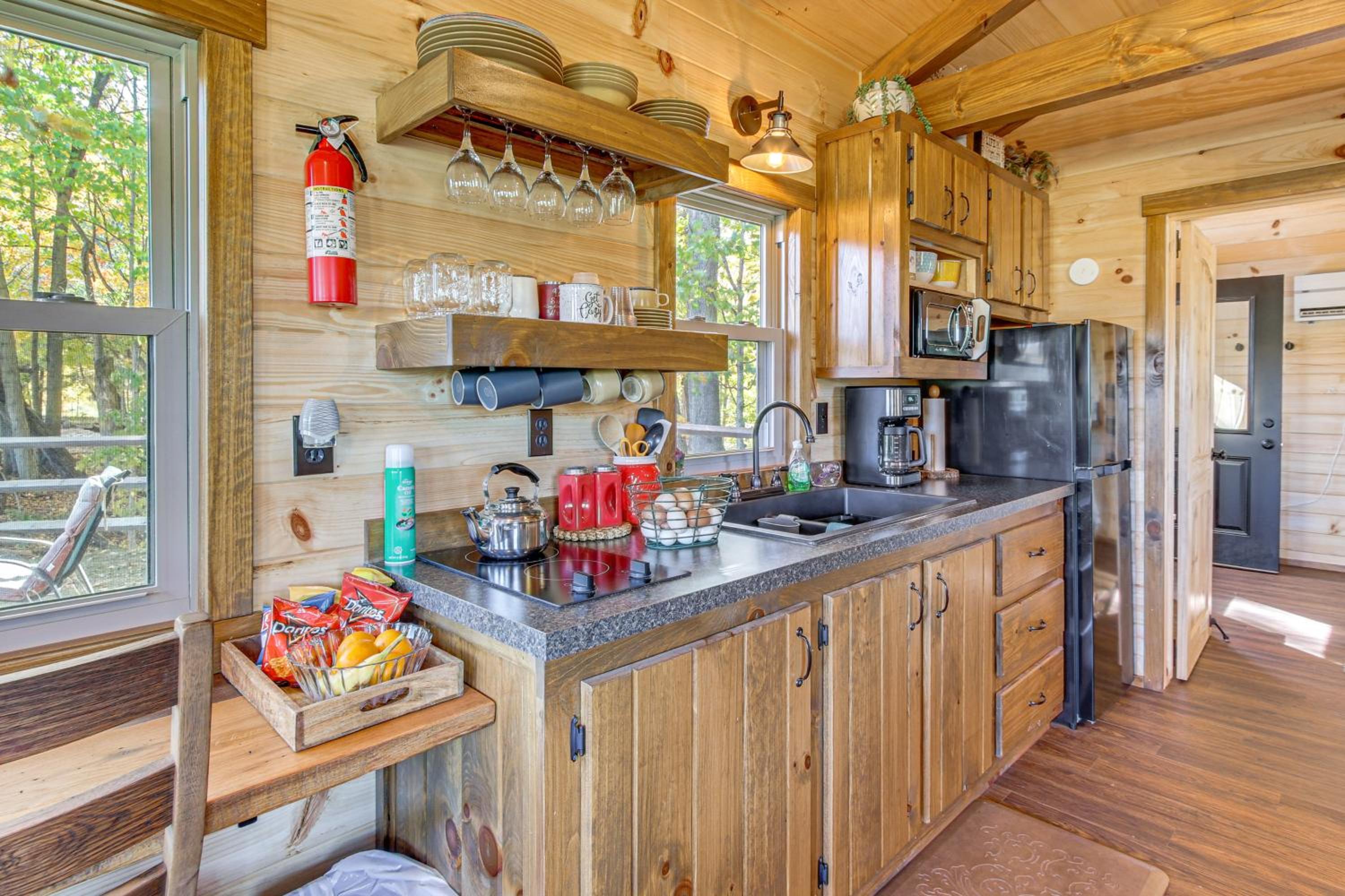 Outdoor Oasis with Fire Pit and Dock Galion Log Cabin