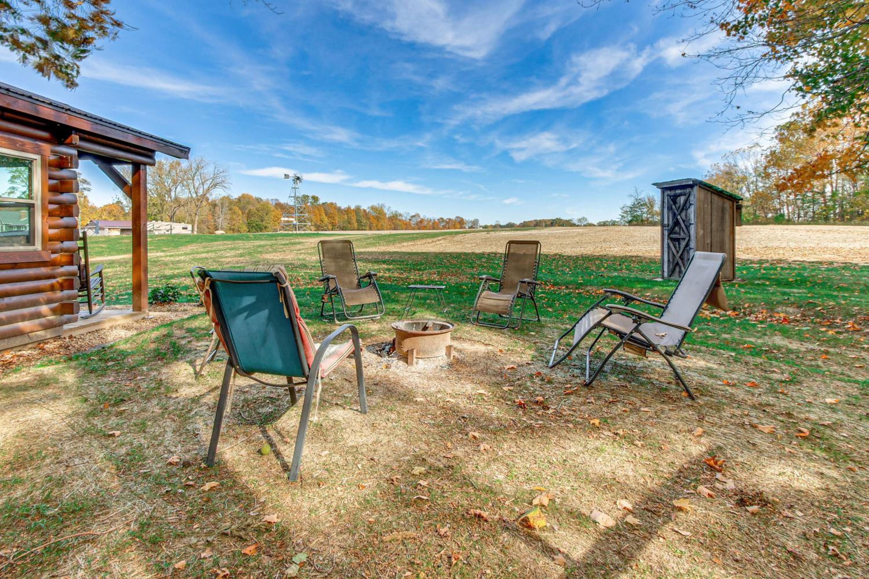 Outdoor Oasis with Fire Pit and Dock Galion Log Cabin