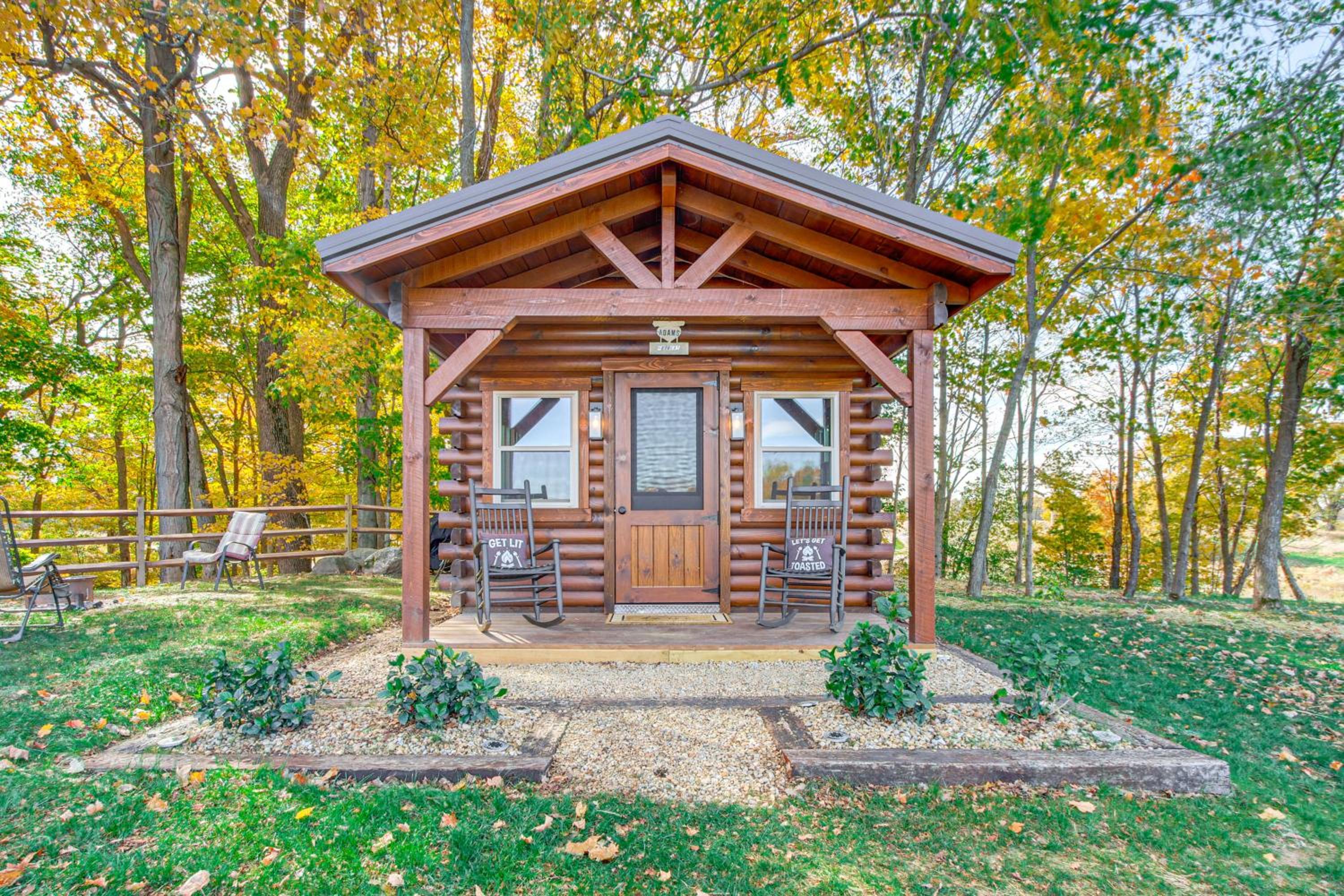 Outdoor Oasis with Fire Pit and Dock Galion Log Cabin