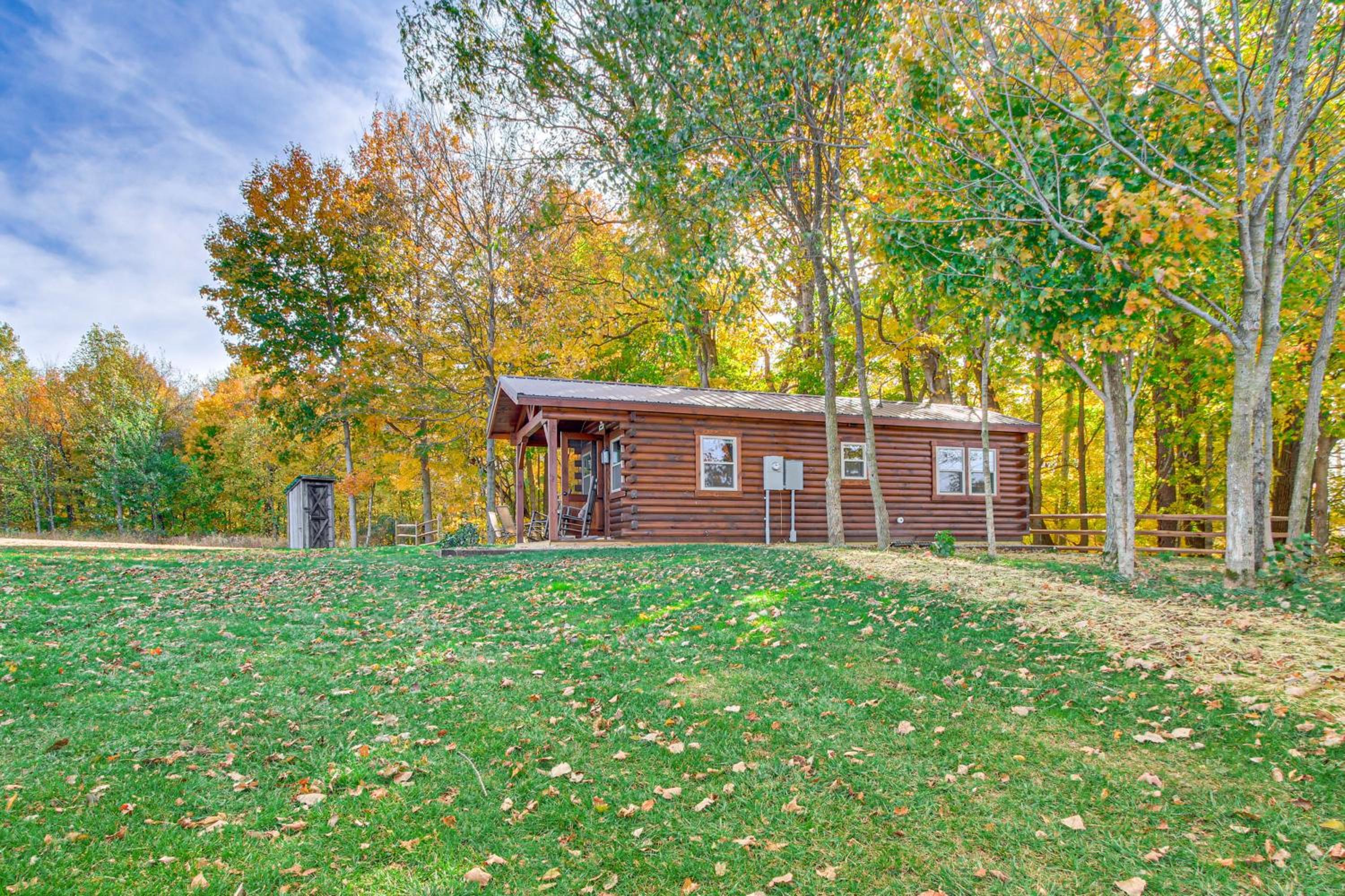 Outdoor Oasis with Fire Pit and Dock Galion Log Cabin