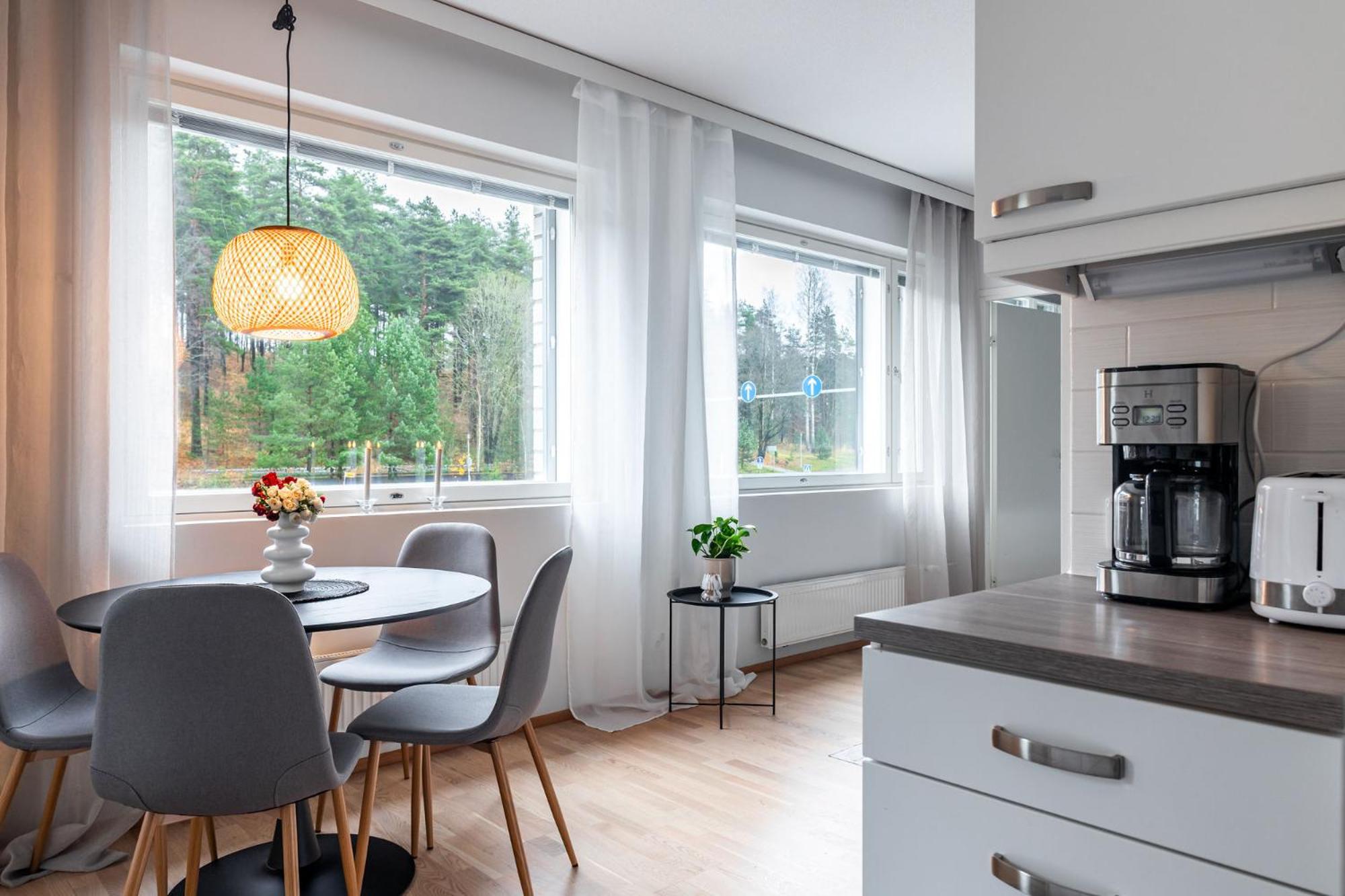 1BR Apartment with Sauna, Balcony & Free Parking