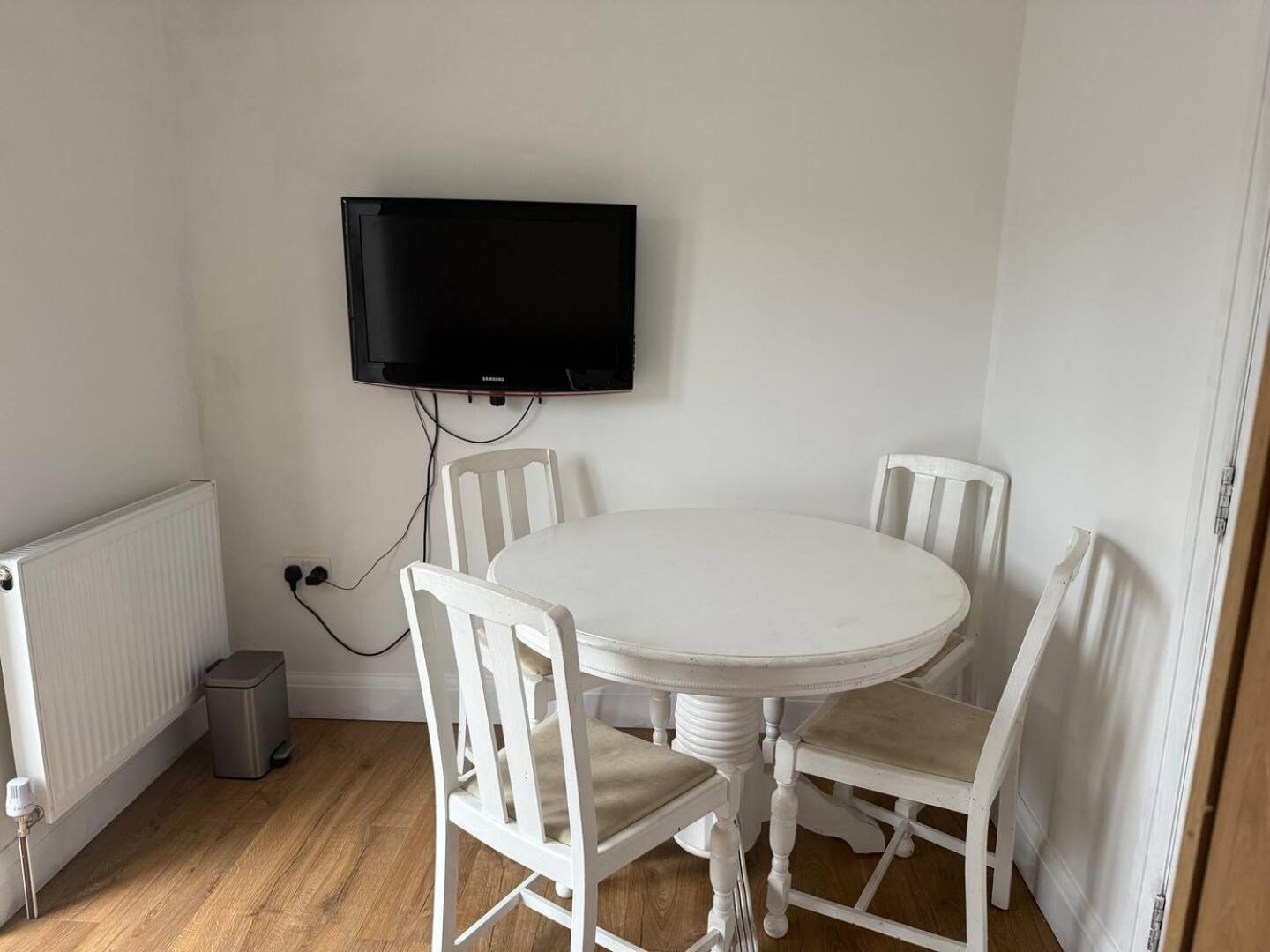Private guest suite inside a family home with own entrance, kitchen, and bathroom