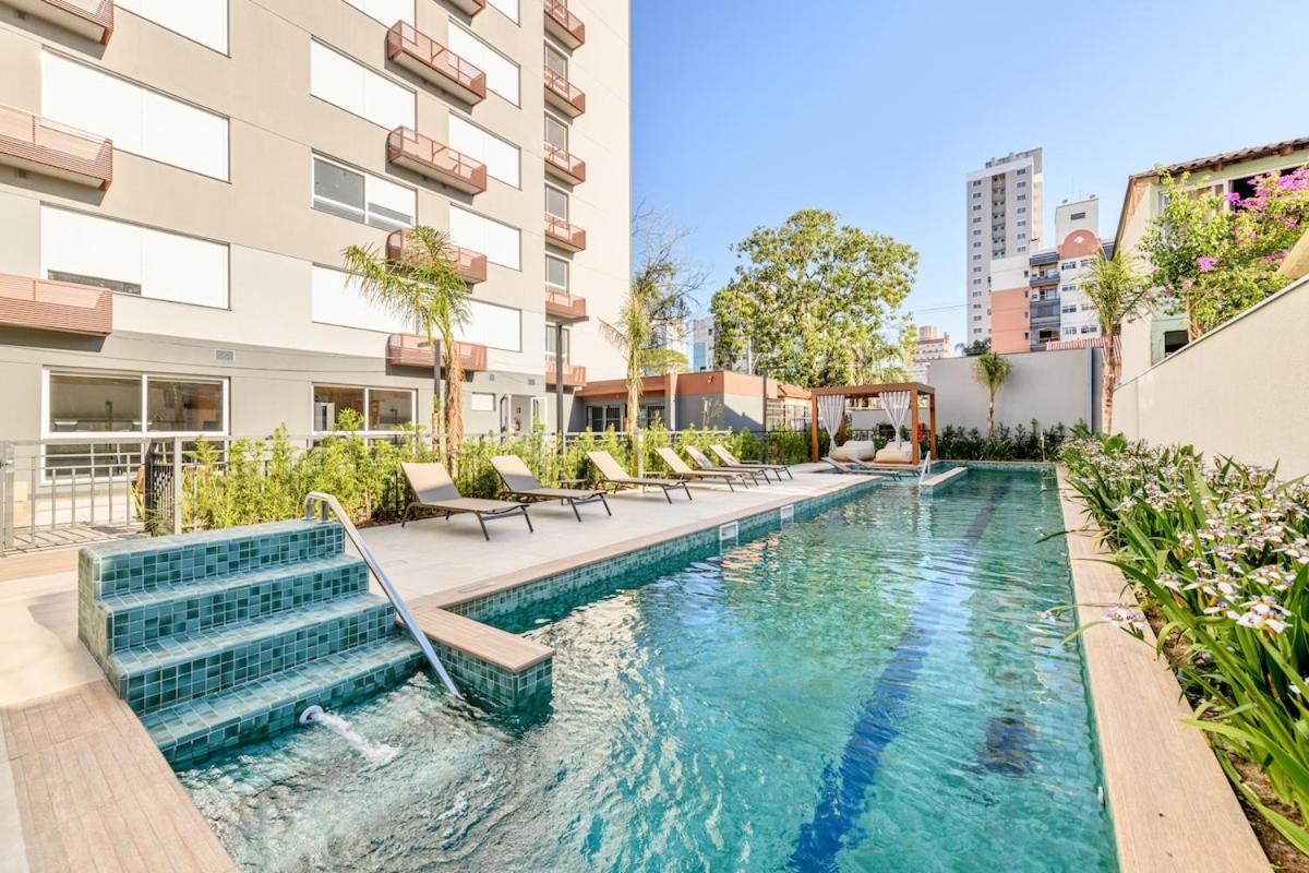 Seu apartamento a passos da PUC-RS e Hosp São Lucas com Vaga Grátis, Piscina, WI-FI