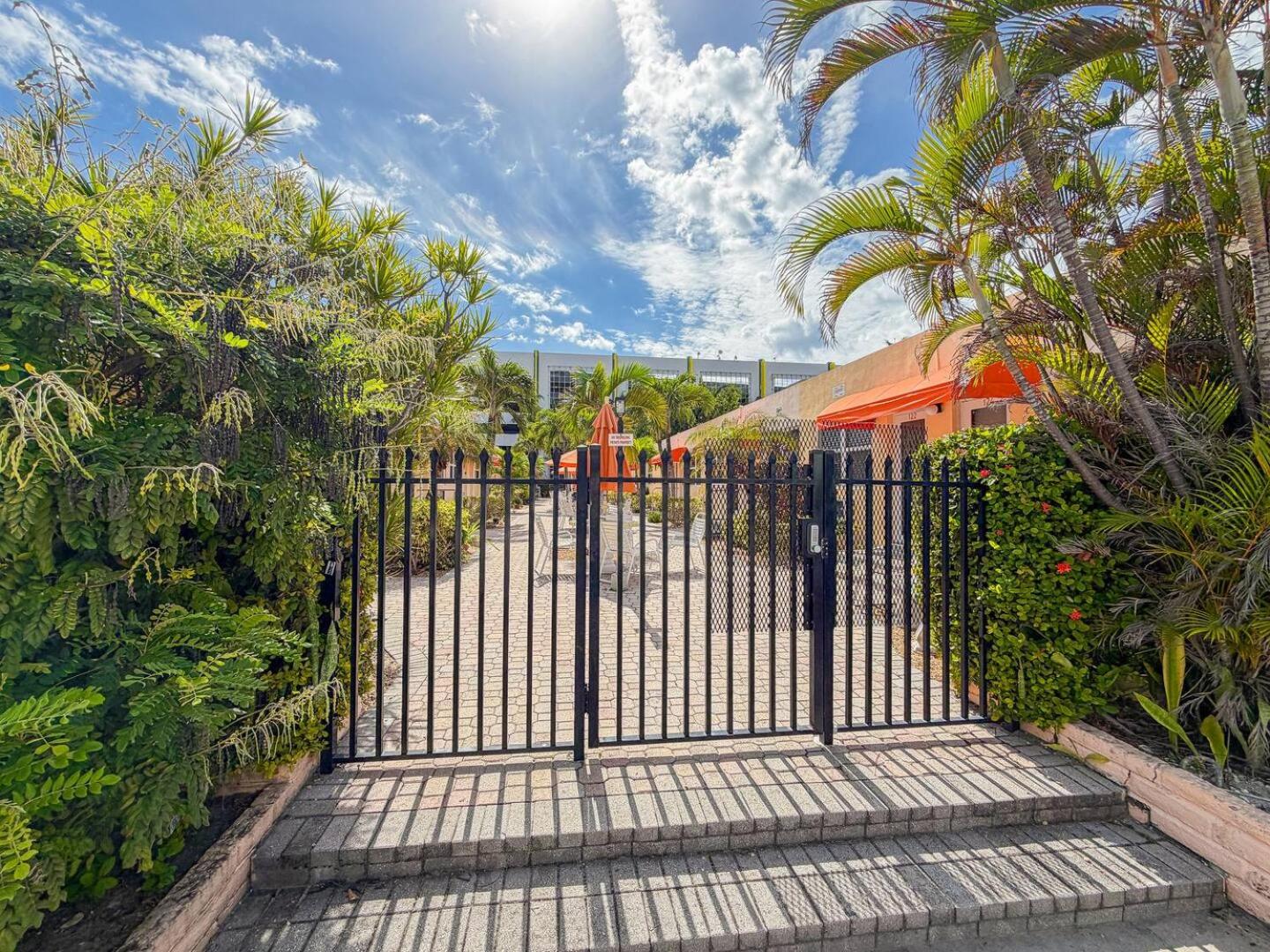 Exclusive studio steps to the beach with pool