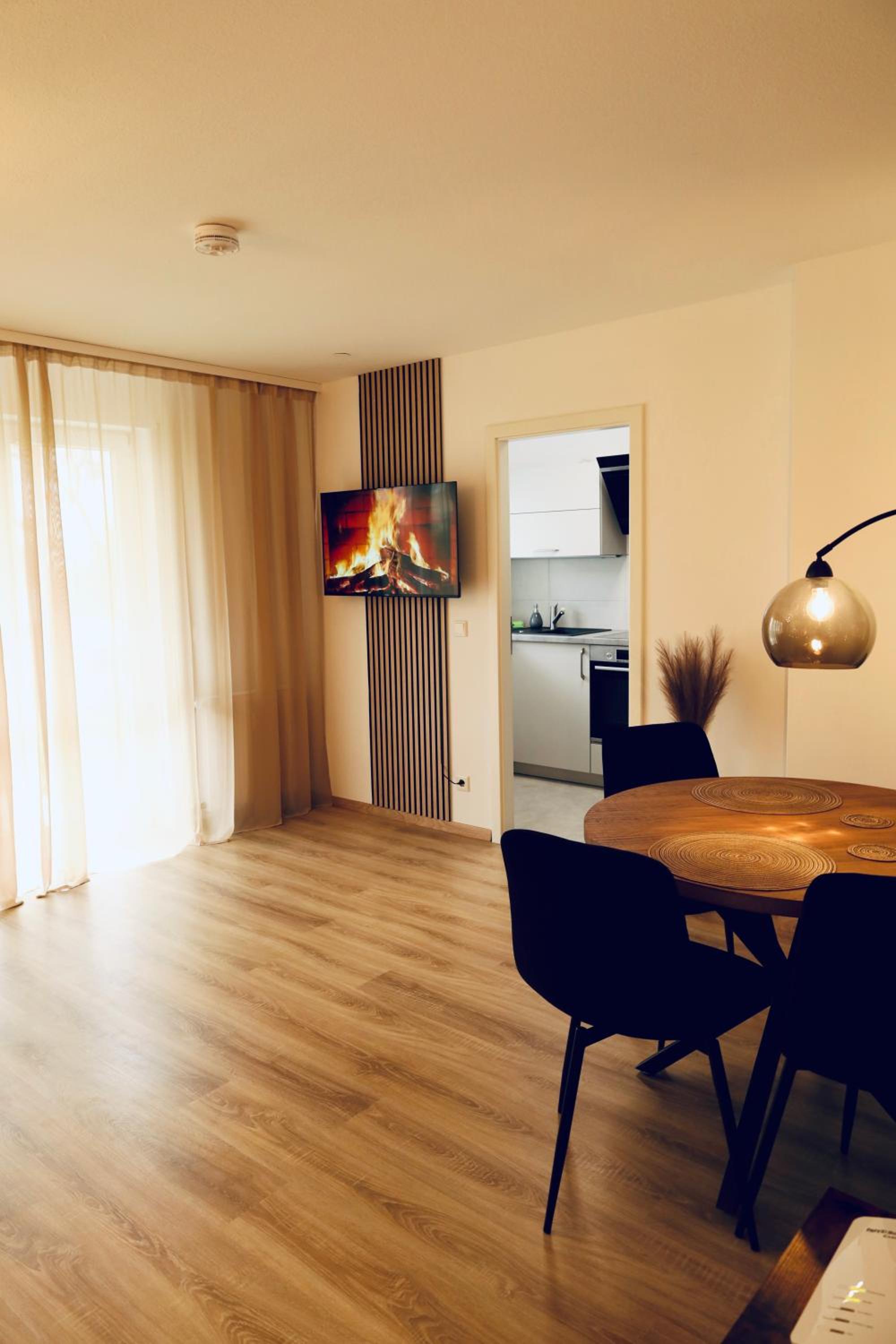 Modernes 2-Zi Apartment mit Terrasse und Garten