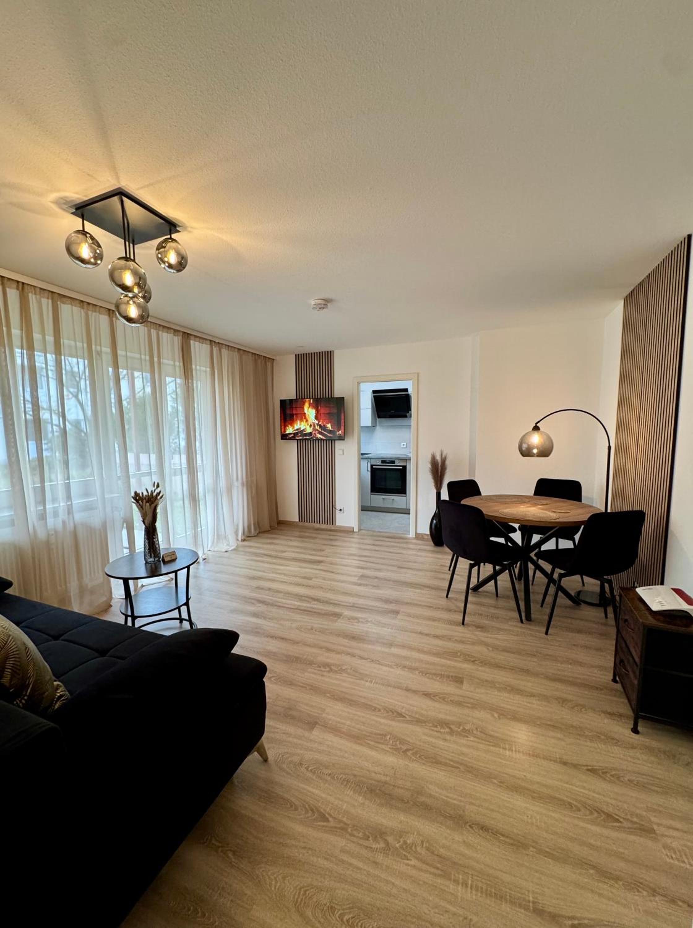 Modernes 2-Zi Apartment mit Terrasse und Garten