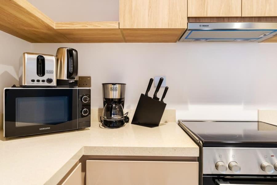 FAM Living Contemporary 2BR Oasis Waterfront Comfort Close to Downtown