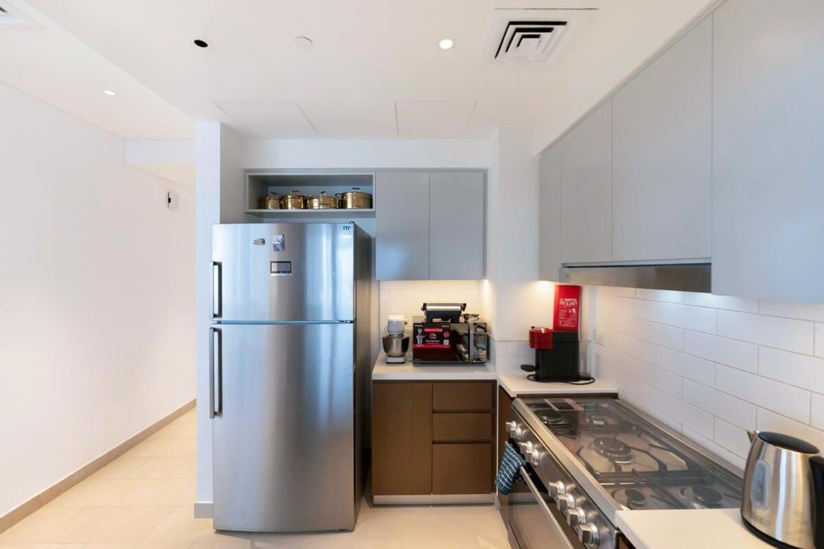 FAM Living - 3BR Creekside Escape in Creek Rise Tower 2