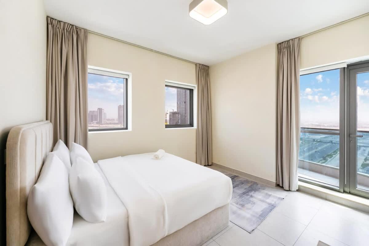 FAM Living - 2BR Apartment with Burj & Canal Views at The Bay