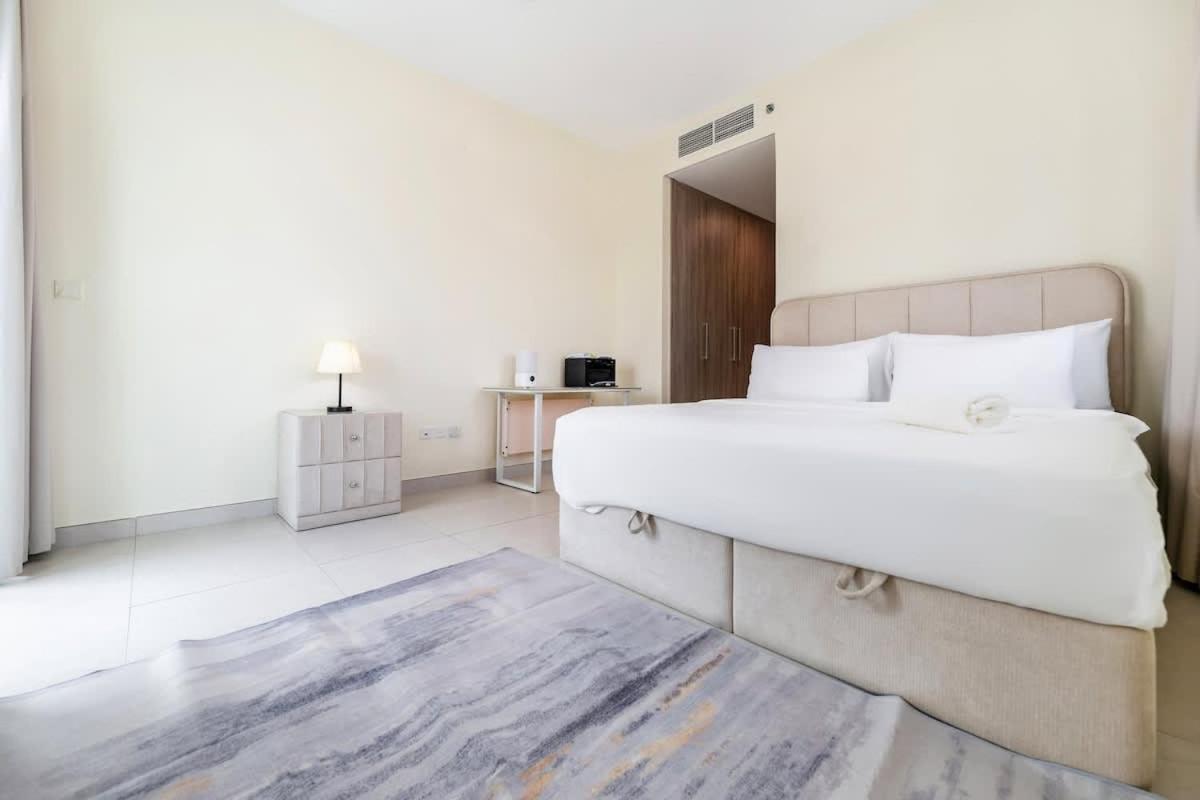 FAM Living - 2BR Apartment with Burj & Canal Views at The Bay