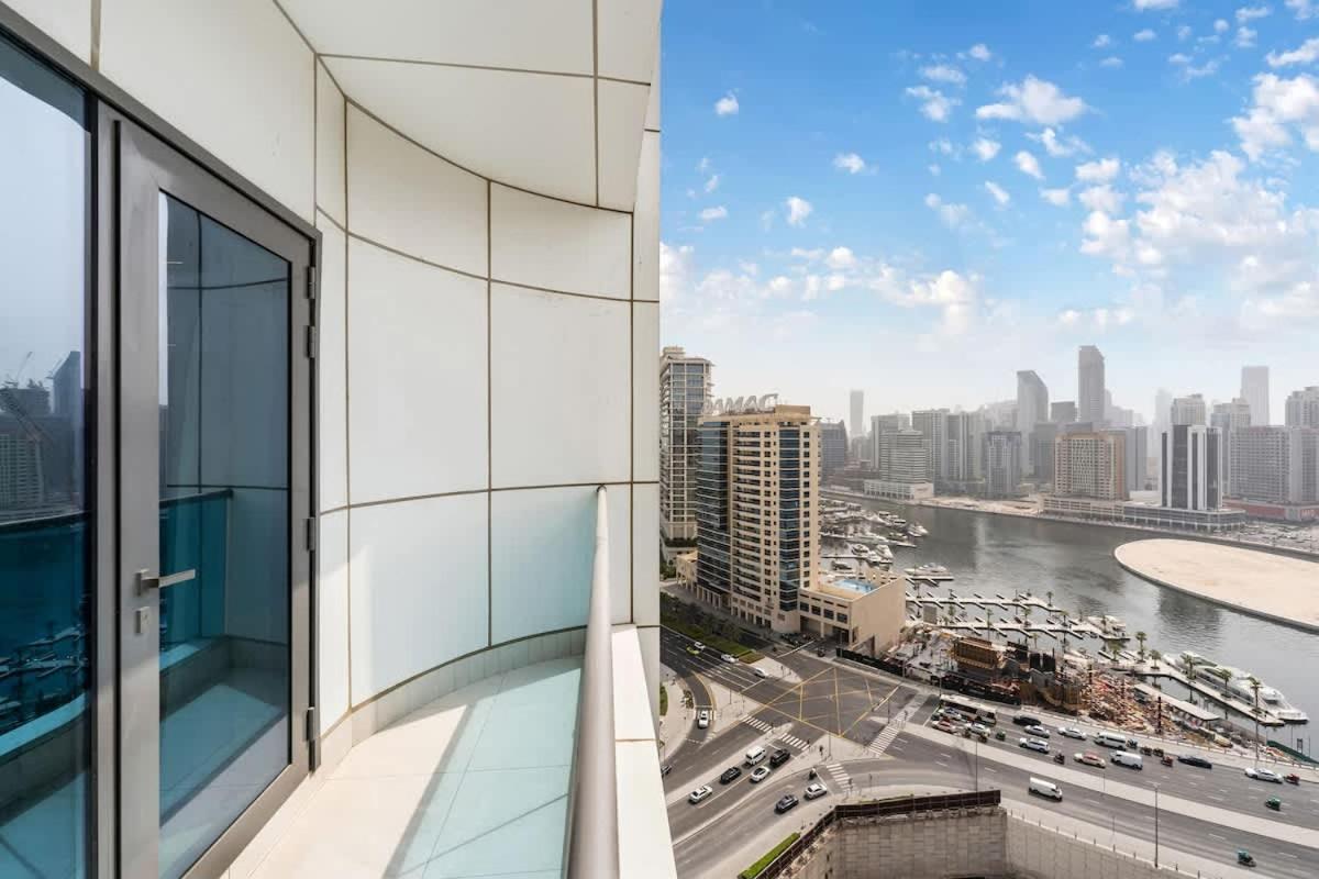 FAM Living - 2BR Apartment with Burj & Canal Views at The Bay