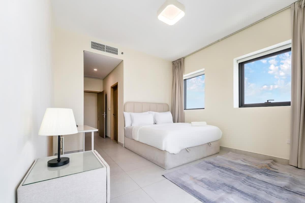 FAM Living - 2BR Apartment with Burj & Canal Views at The Bay