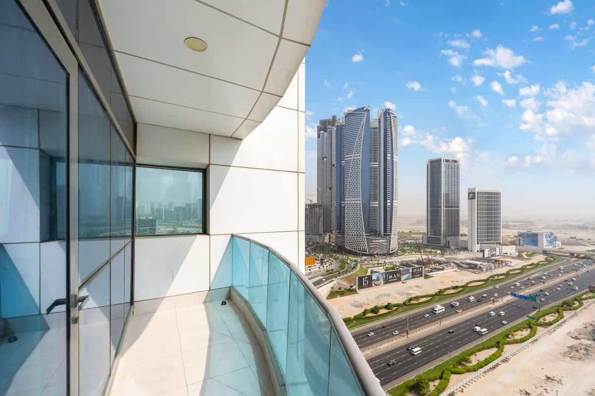 FAM Living - 2BR Apartment with Burj & Canal Views at The Bay