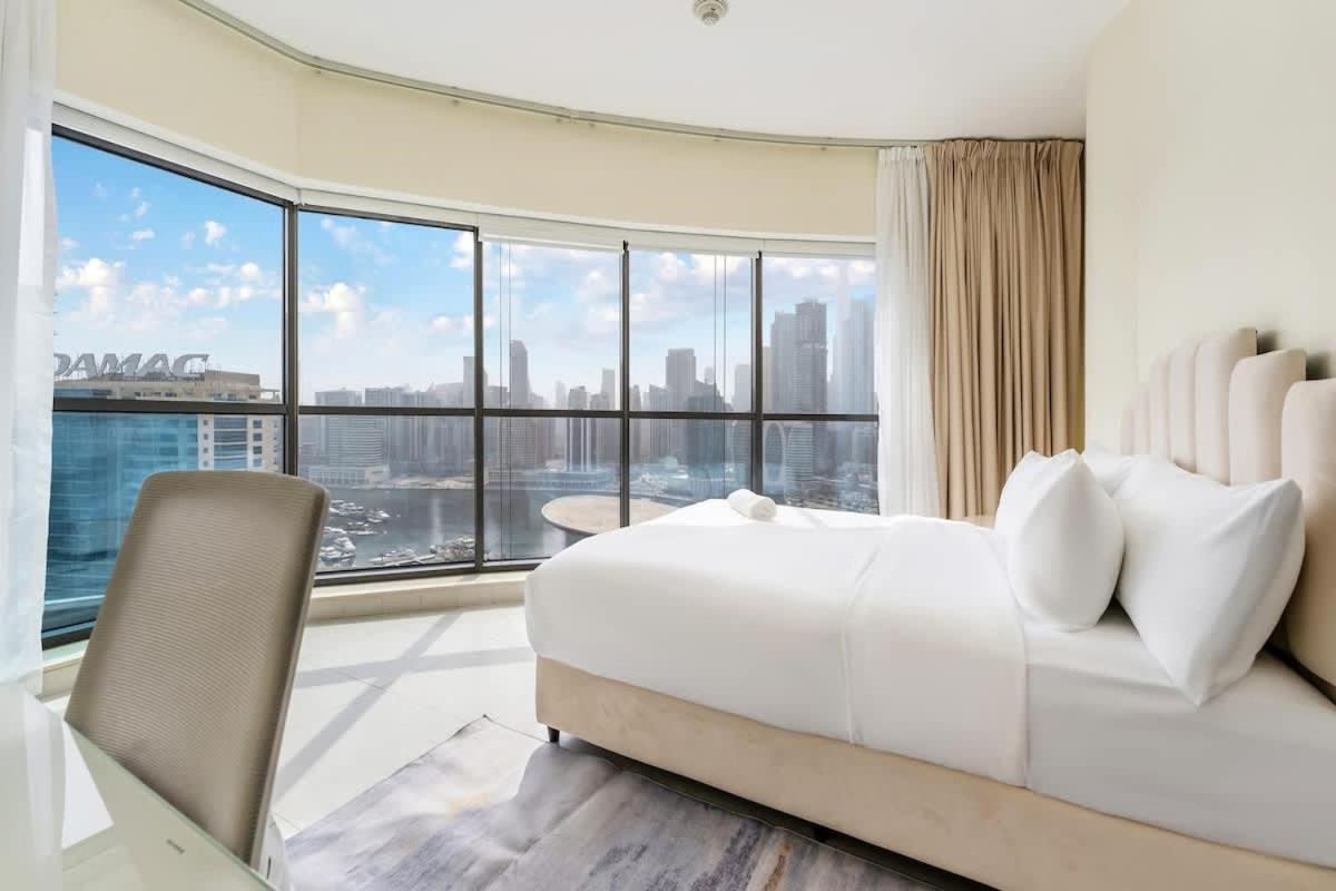 FAM Living - 2BR Apartment with Burj & Canal Views at The Bay