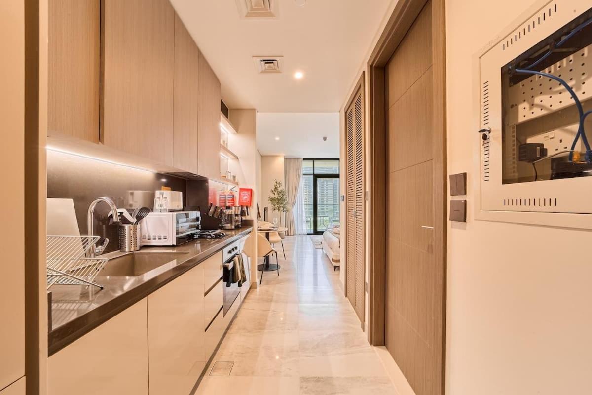 FAM Living Dubai Escape Sleek Studio at Peninsula Five