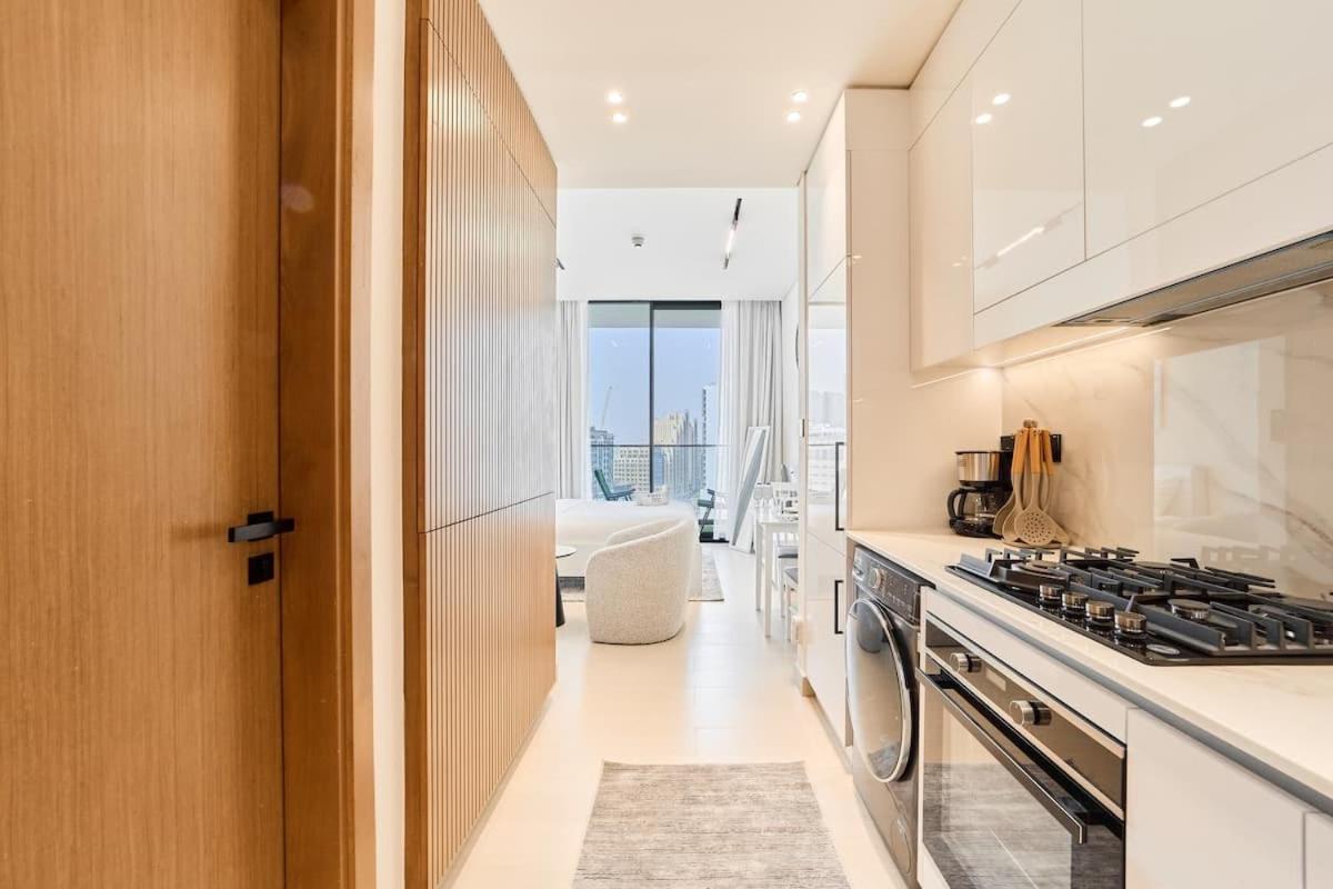 FAM Living Stylish Studio Apartment in Binghatti Azure JVC