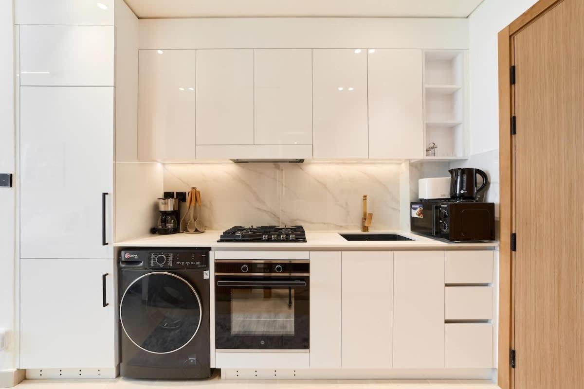 FAM Living Stylish Studio Apartment in Binghatti Azure JVC