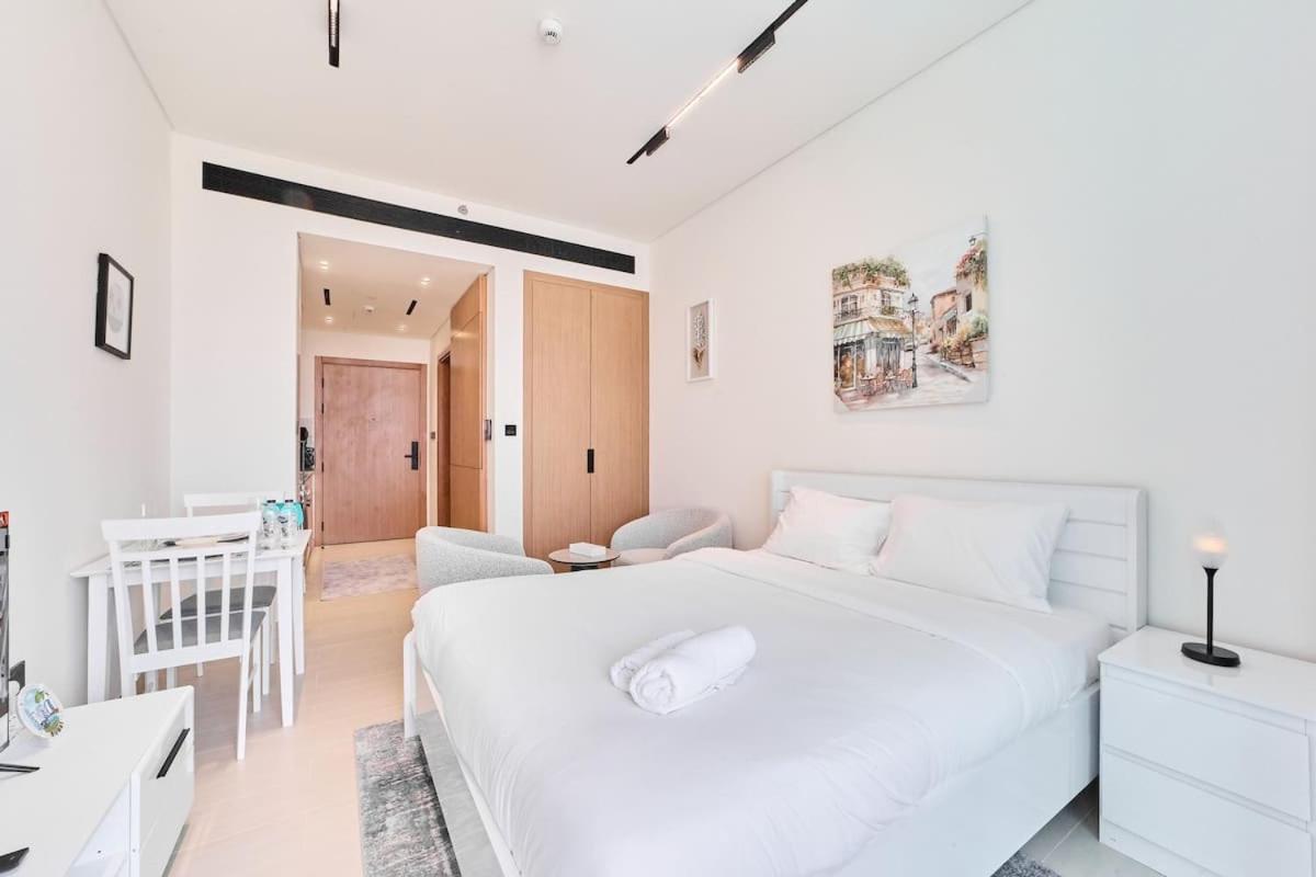 FAM Living Stylish Studio Apartment in Binghatti Azure JVC