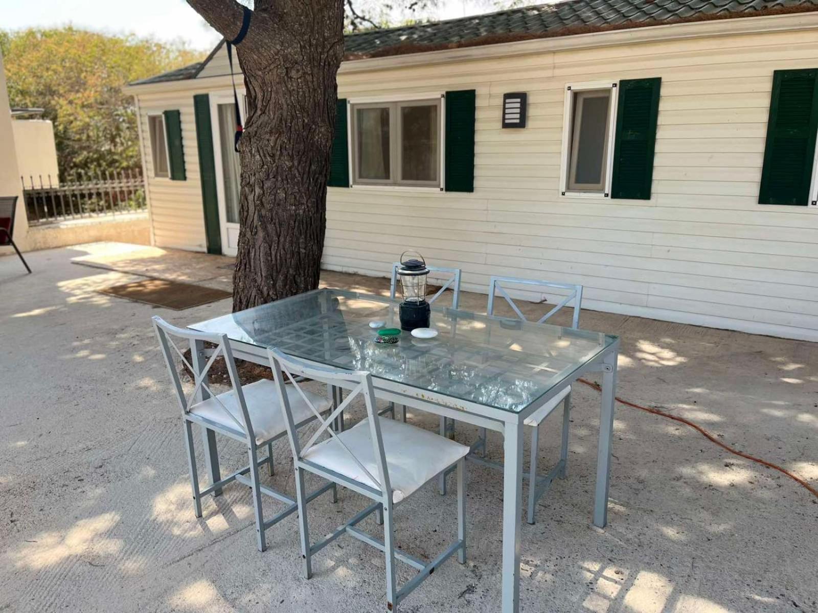 Family mobile home solar powered near the sea and the airport
