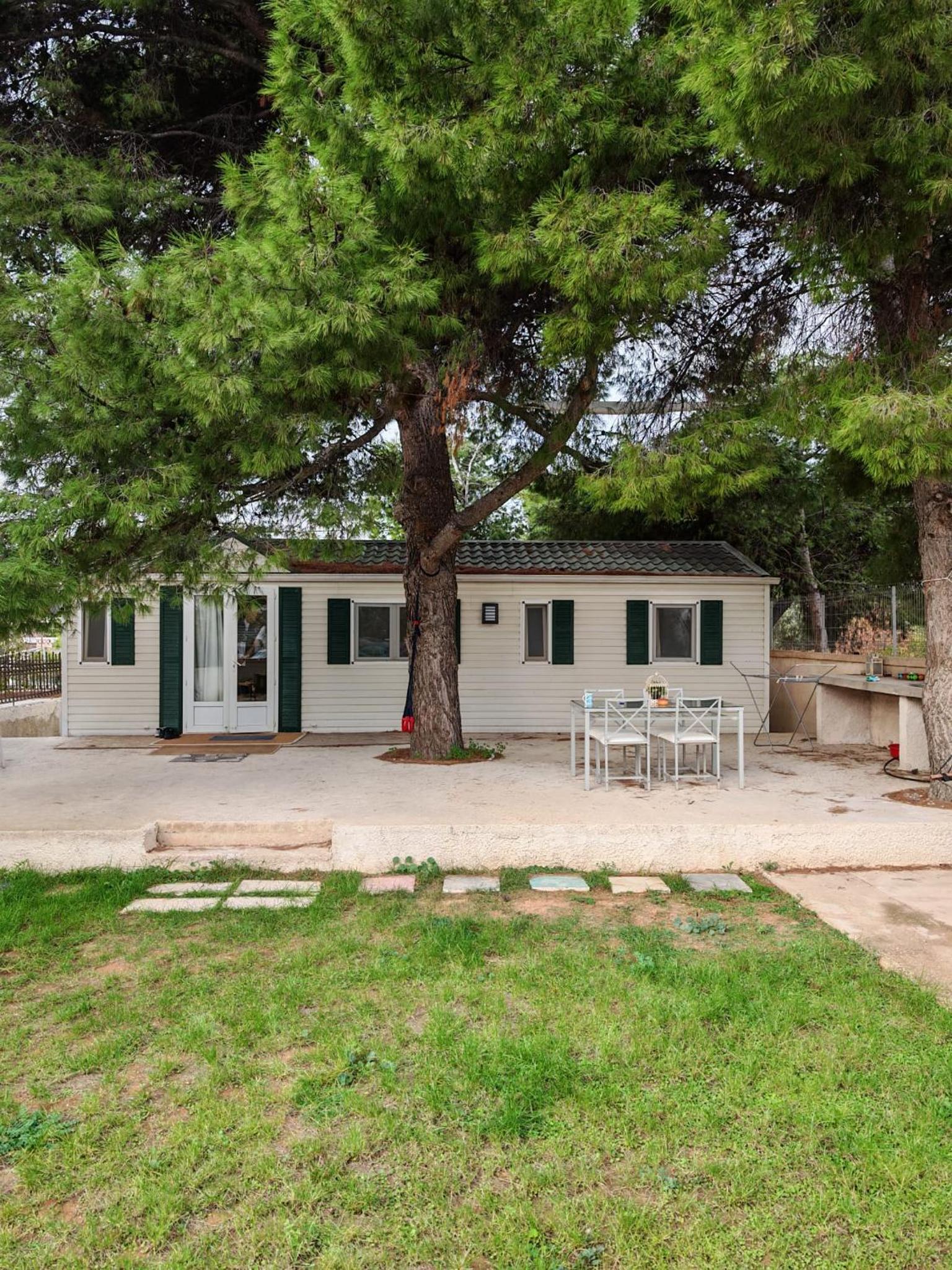 Family mobile home solar powered near the sea and the airport