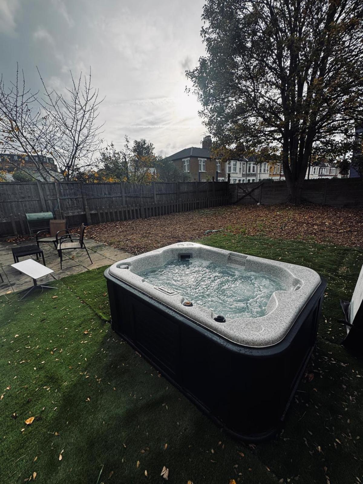 Stylish Wembley Home with Hot Tub, Parking & Garden