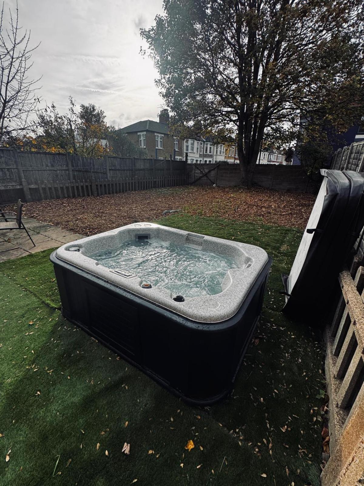 Stylish Wembley Home with Hot Tub, Parking & Garden