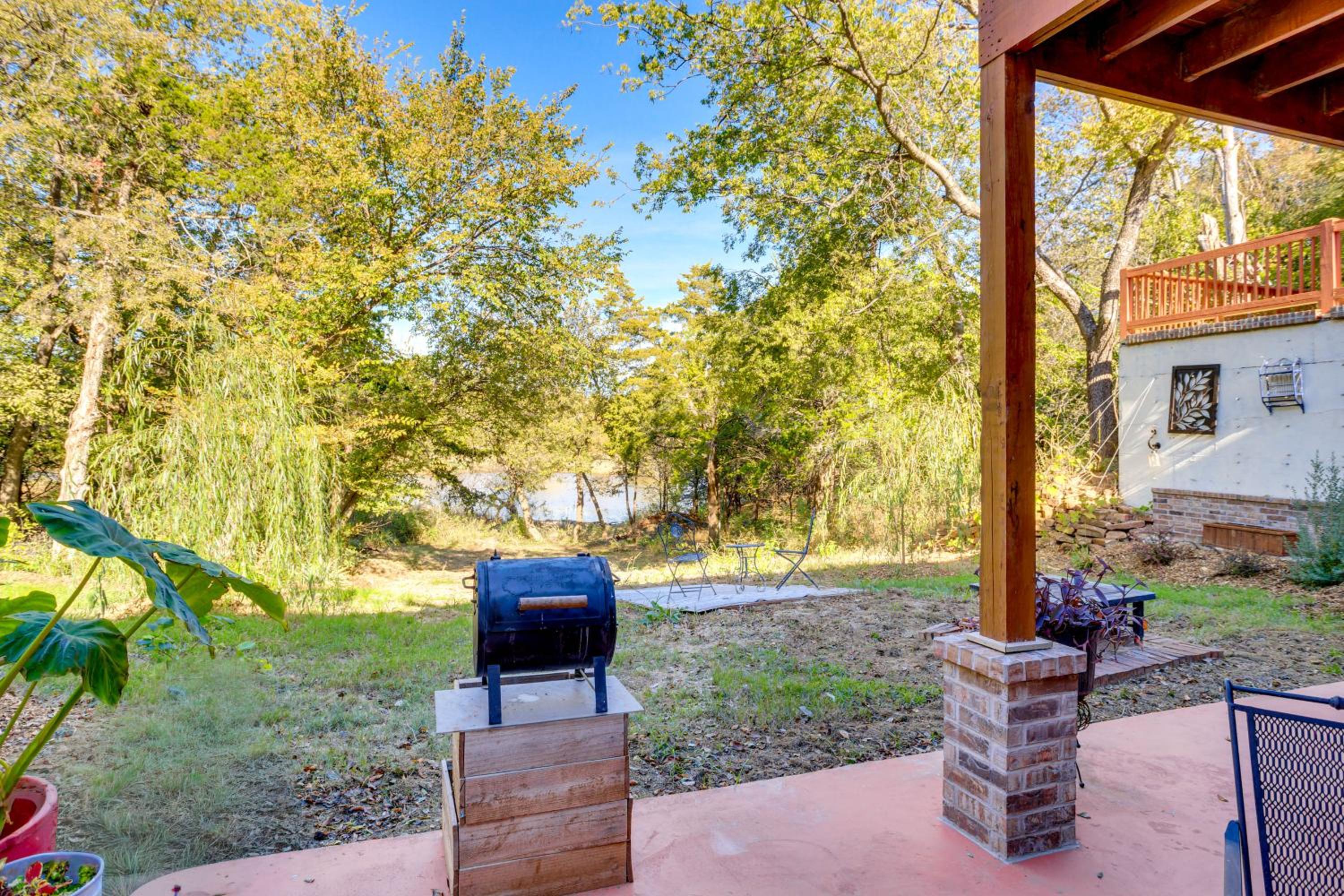 Lakefront Getaway with Hot Tub and Yard in OKC!