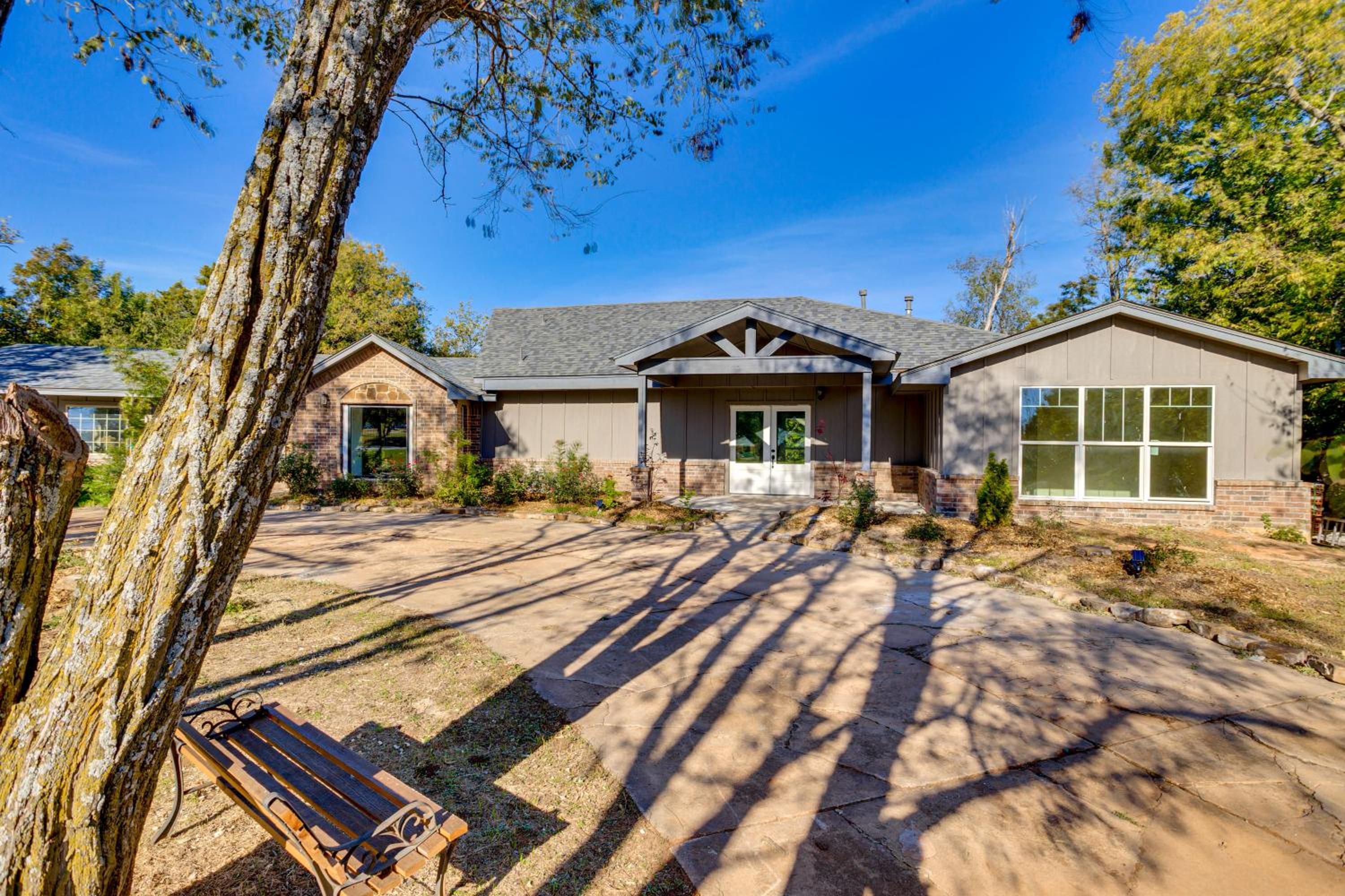 Lakefront Getaway with Hot Tub and Yard in OKC!