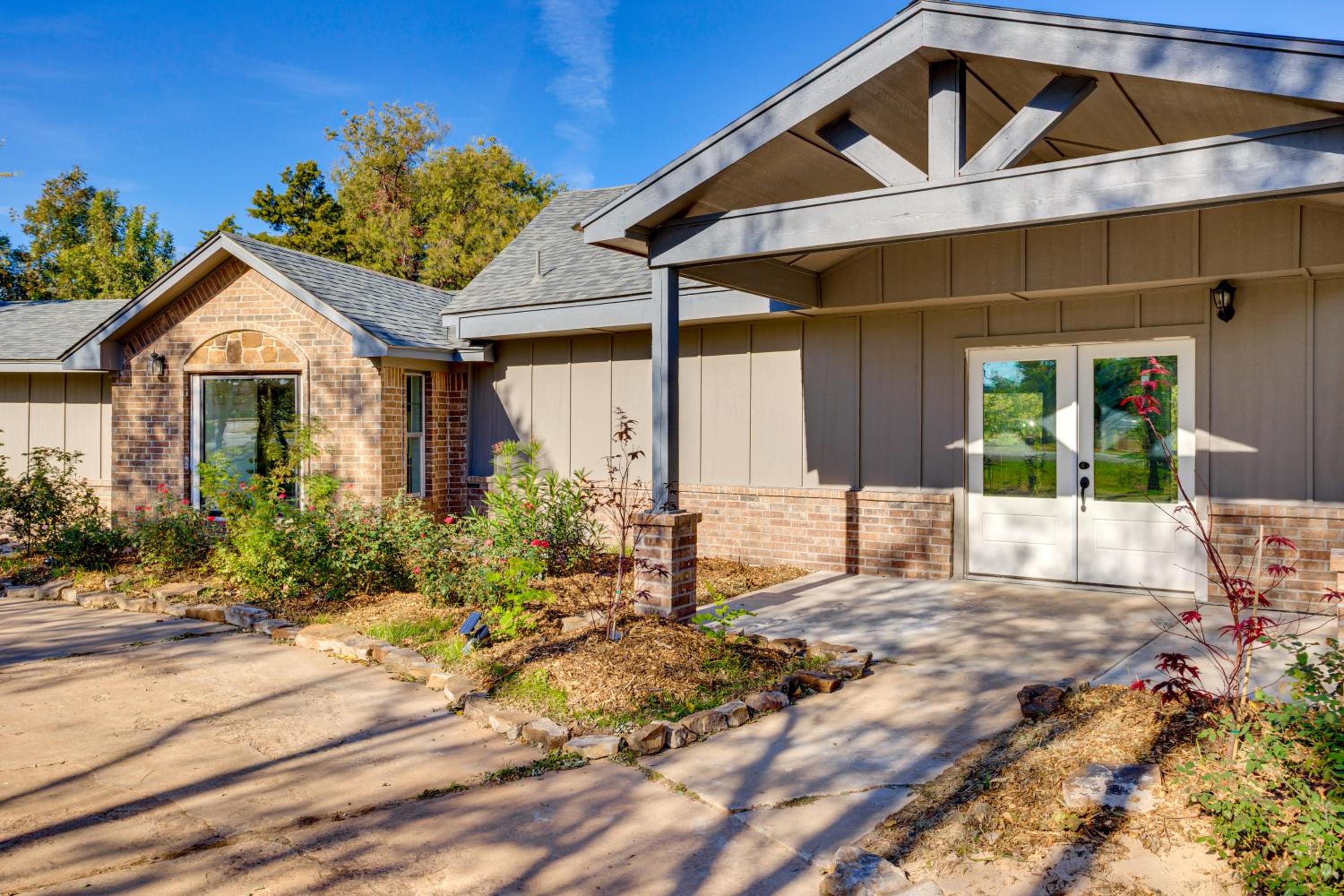 Lakefront Getaway with Hot Tub and Yard in OKC!