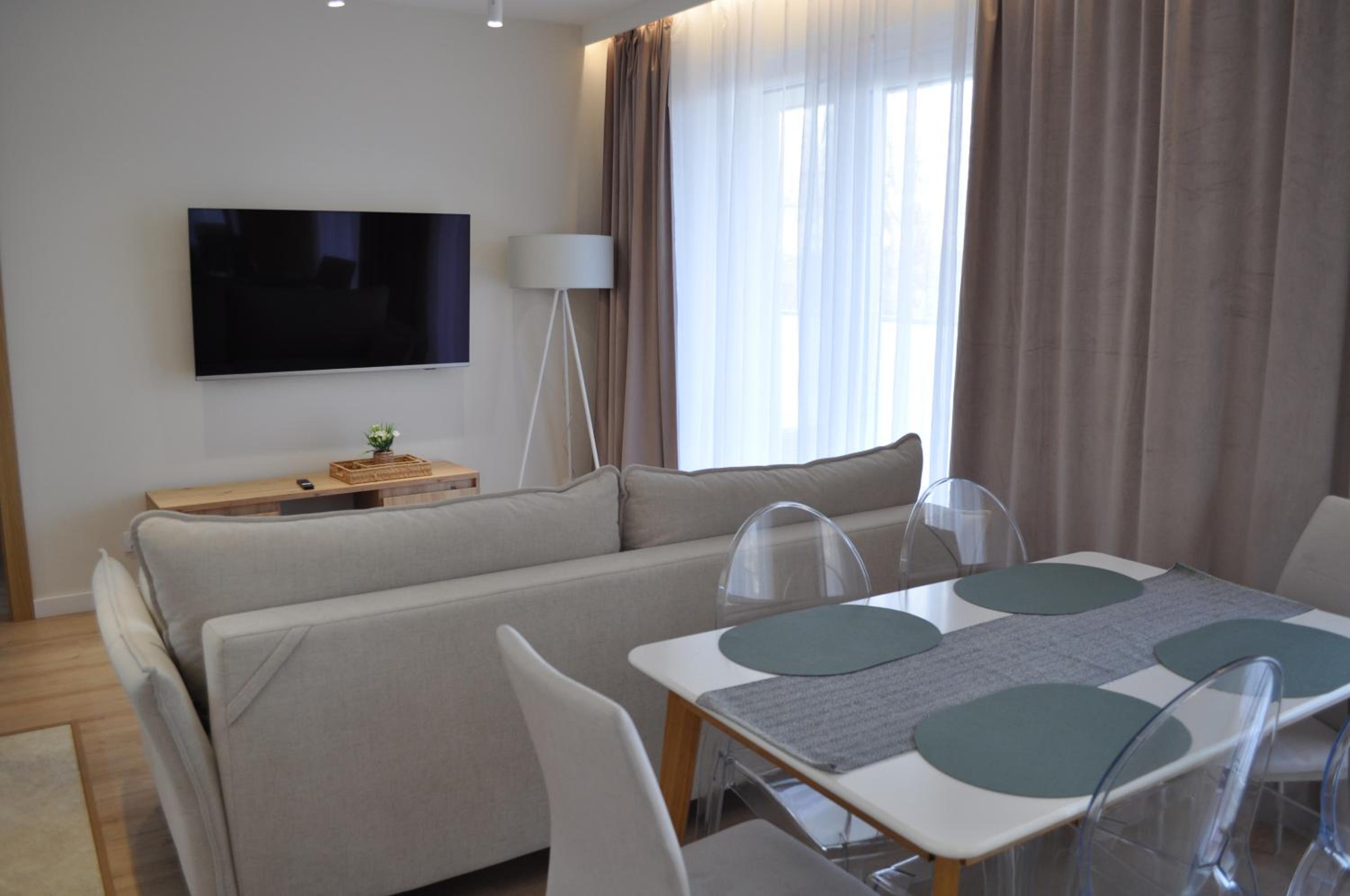 4SUMMER Golden Dune - Parking, przestronne mieszkanie 50m2, cały apartament do dyspozycji, duży taras z pięknym zachodem słońca Parkplatz, geräumige Wohnun
