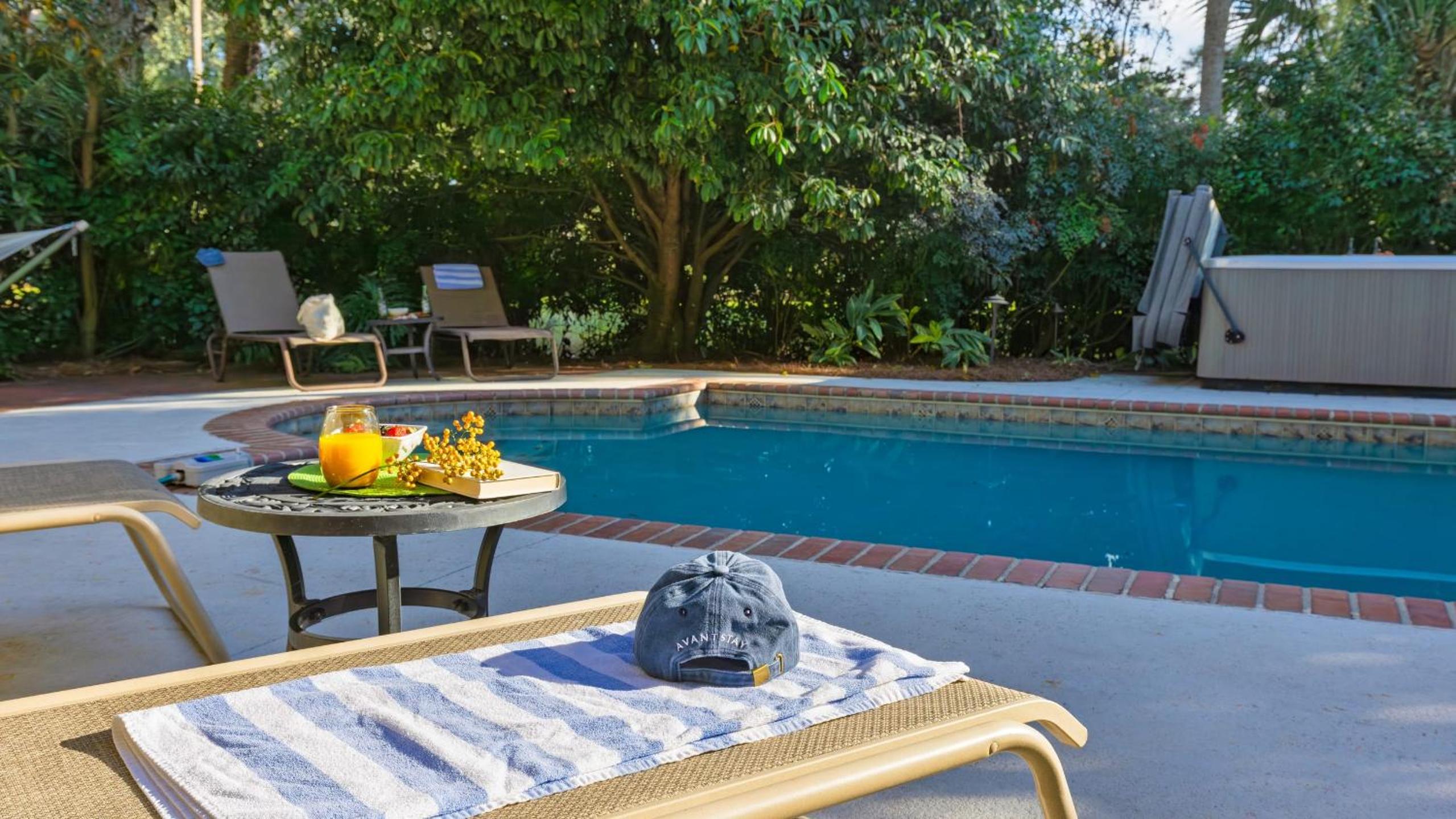 Pool Hot Tub Fairway Views Quick Bike Ride to Beach Loblolly Retreat by Avantstay