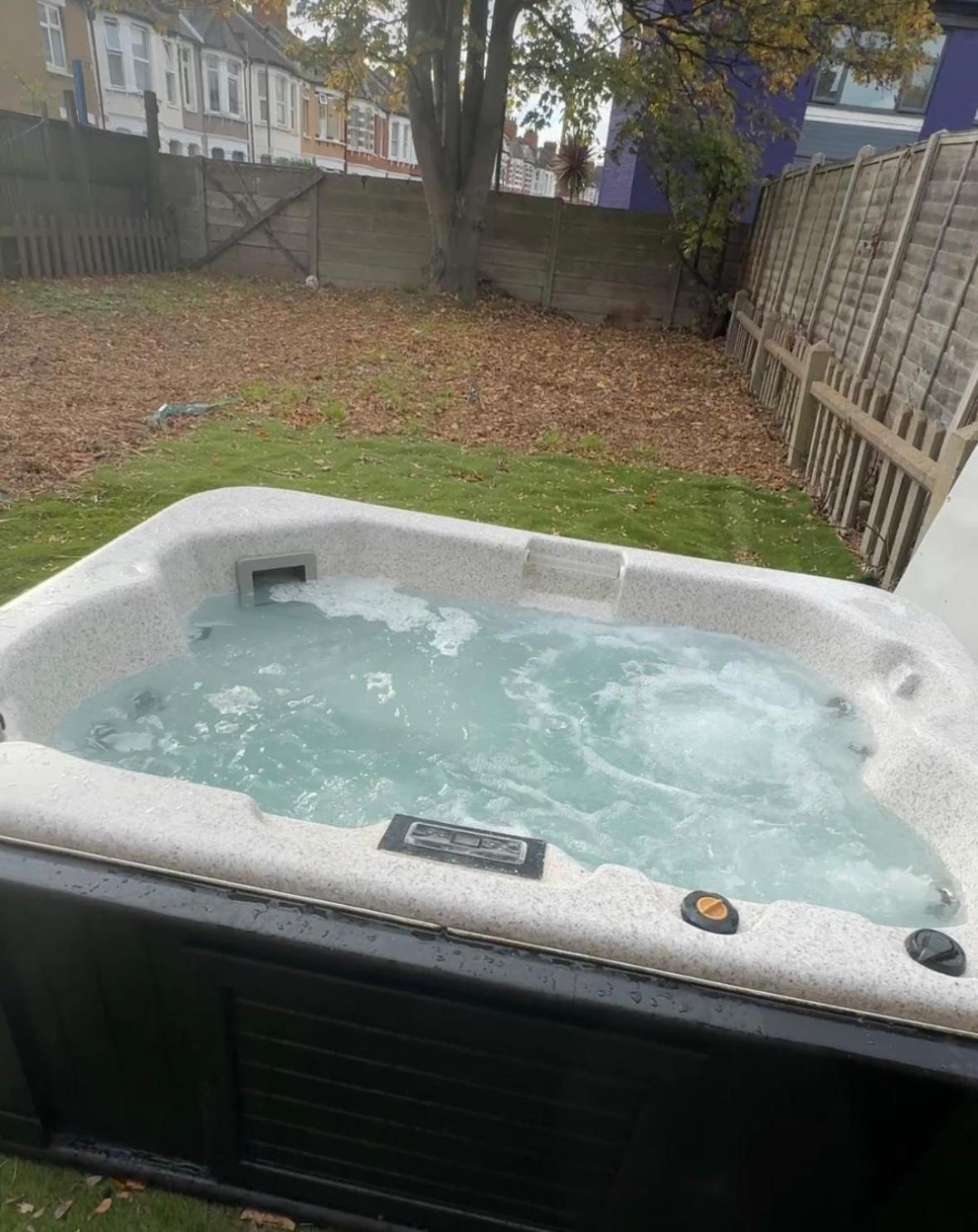 Stylish Wembley Home with Hot Tub, Parking & Garden