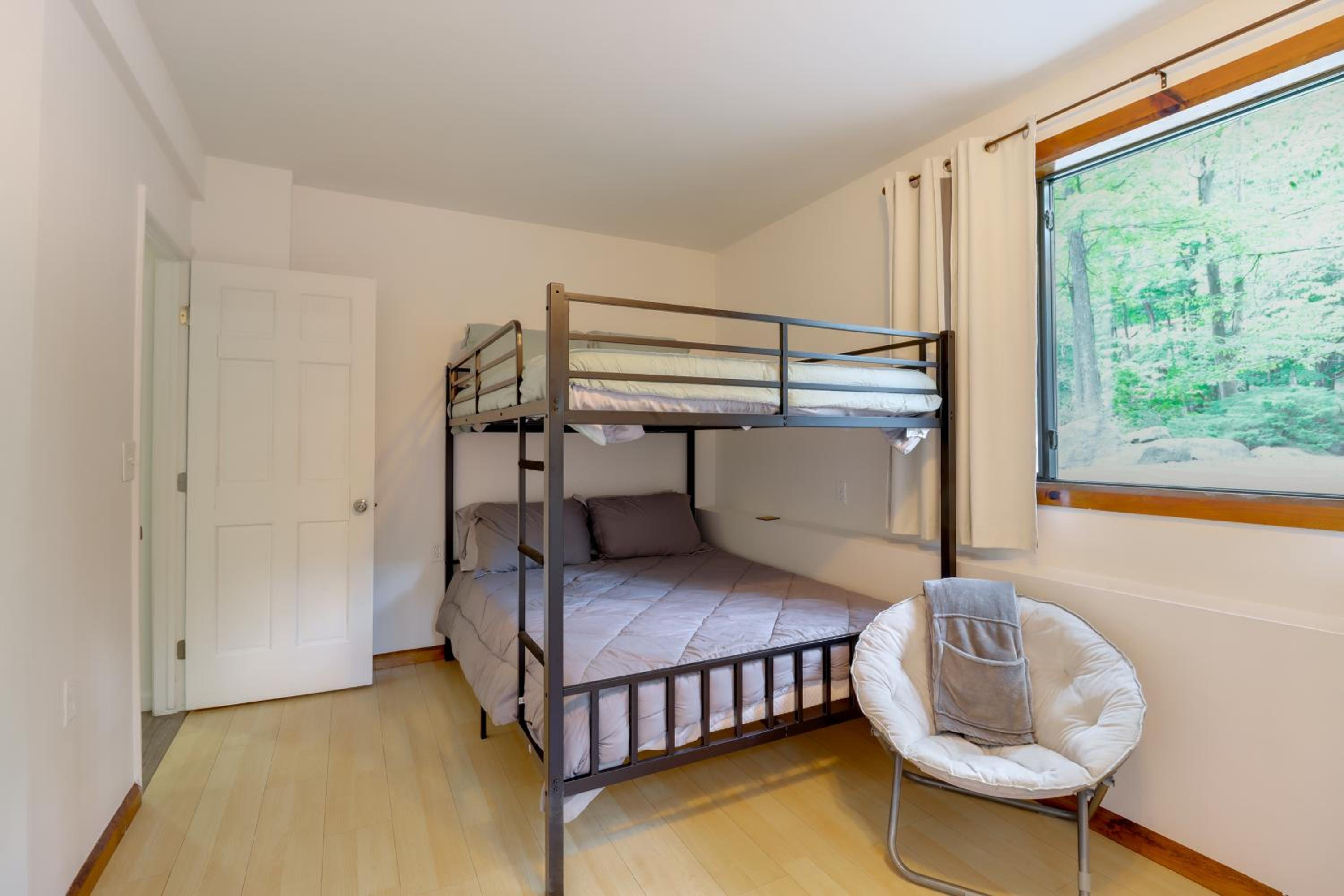1 Mi to Lake, Golf and Ski Access The Hideout Home!