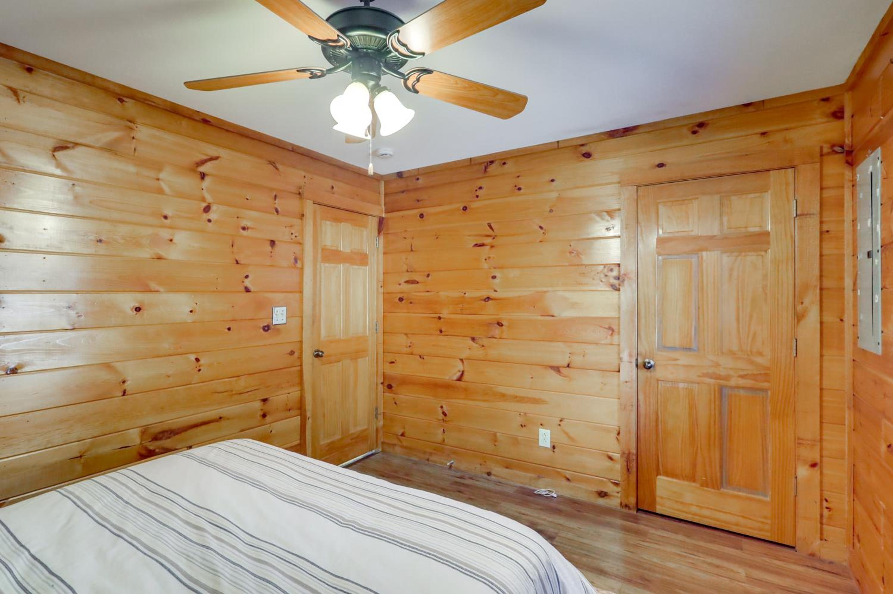 Steps to Lake Lanier Wooded Escape with Boat Dock