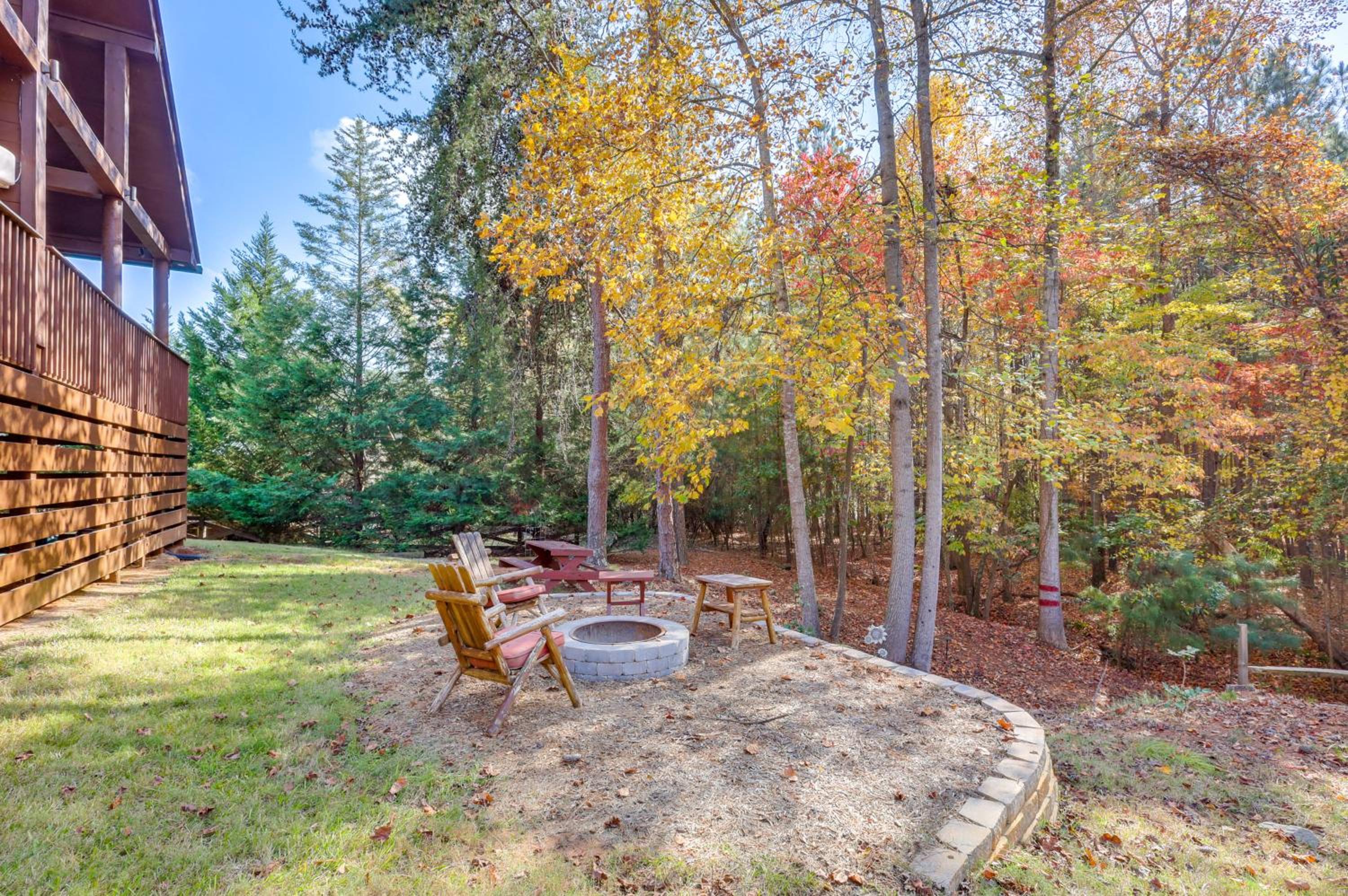 Steps to Lake Lanier Wooded Escape with Boat Dock