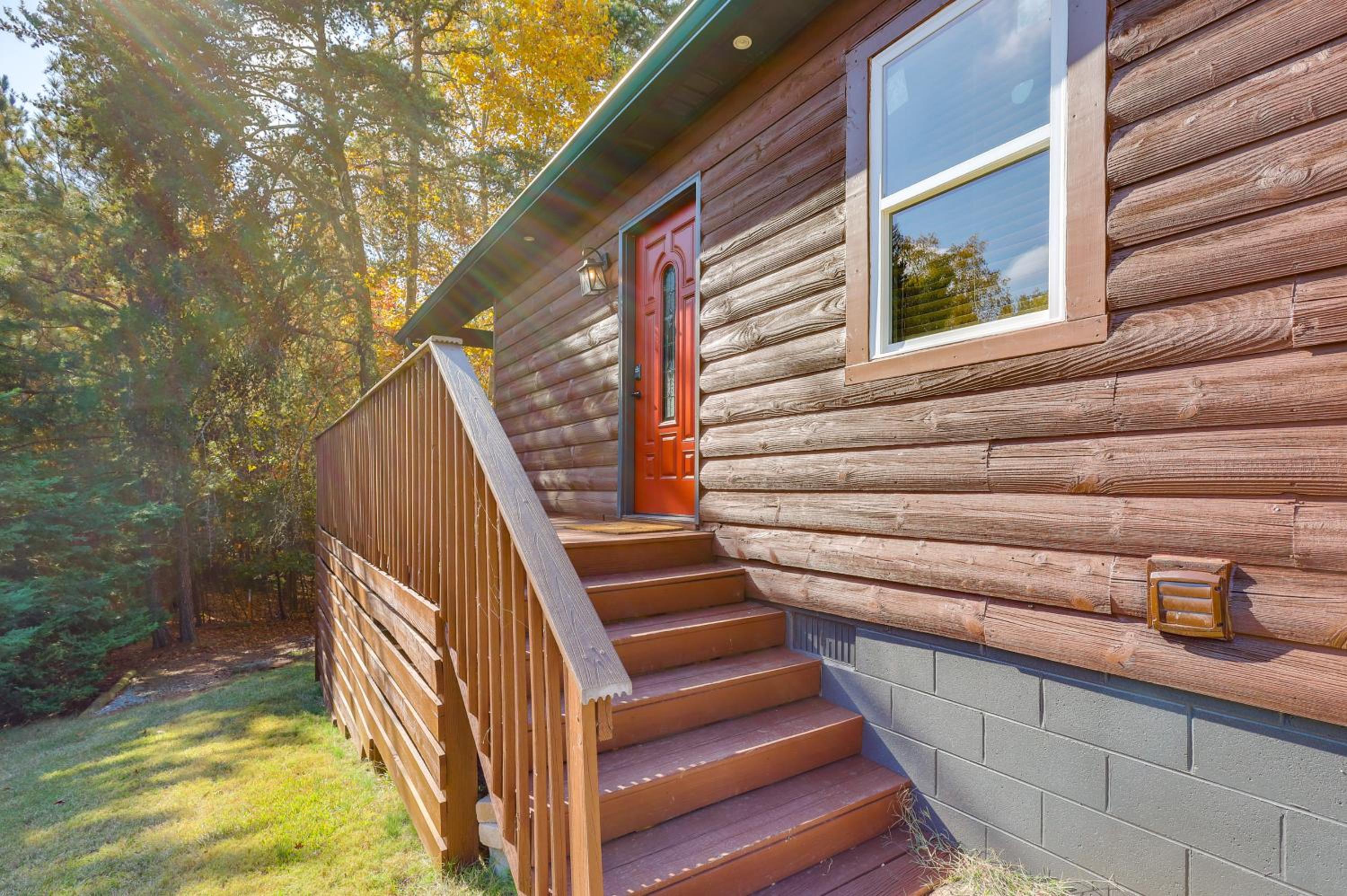 Steps to Lake Lanier Wooded Escape with Boat Dock