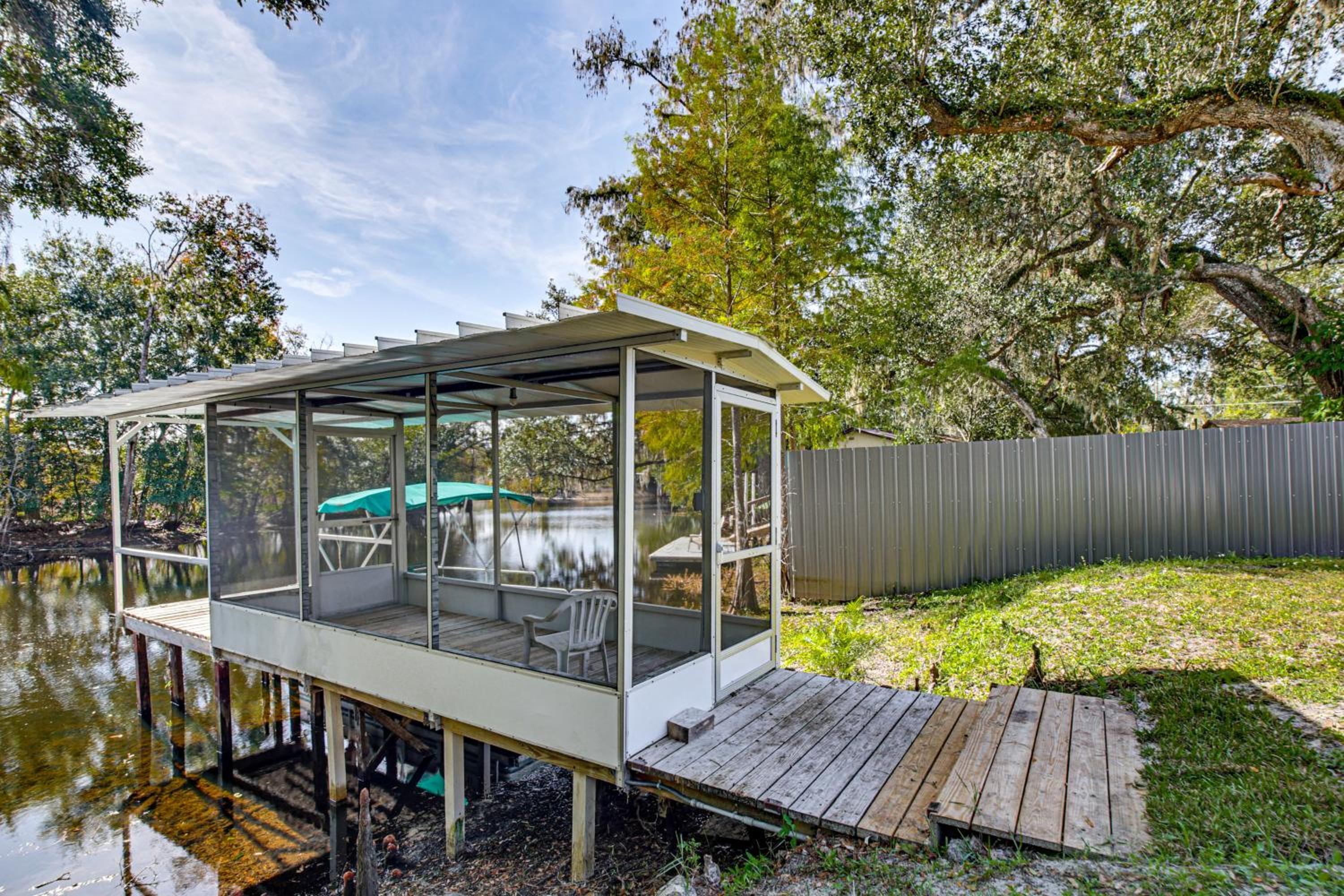 Riverfront Floral City Stay with Dock and Hot Tub!