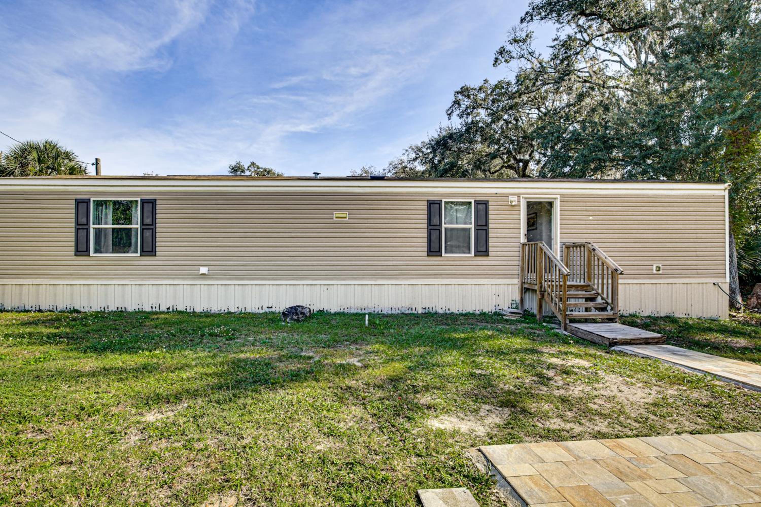 Riverfront Floral City Stay with Dock and Hot Tub!