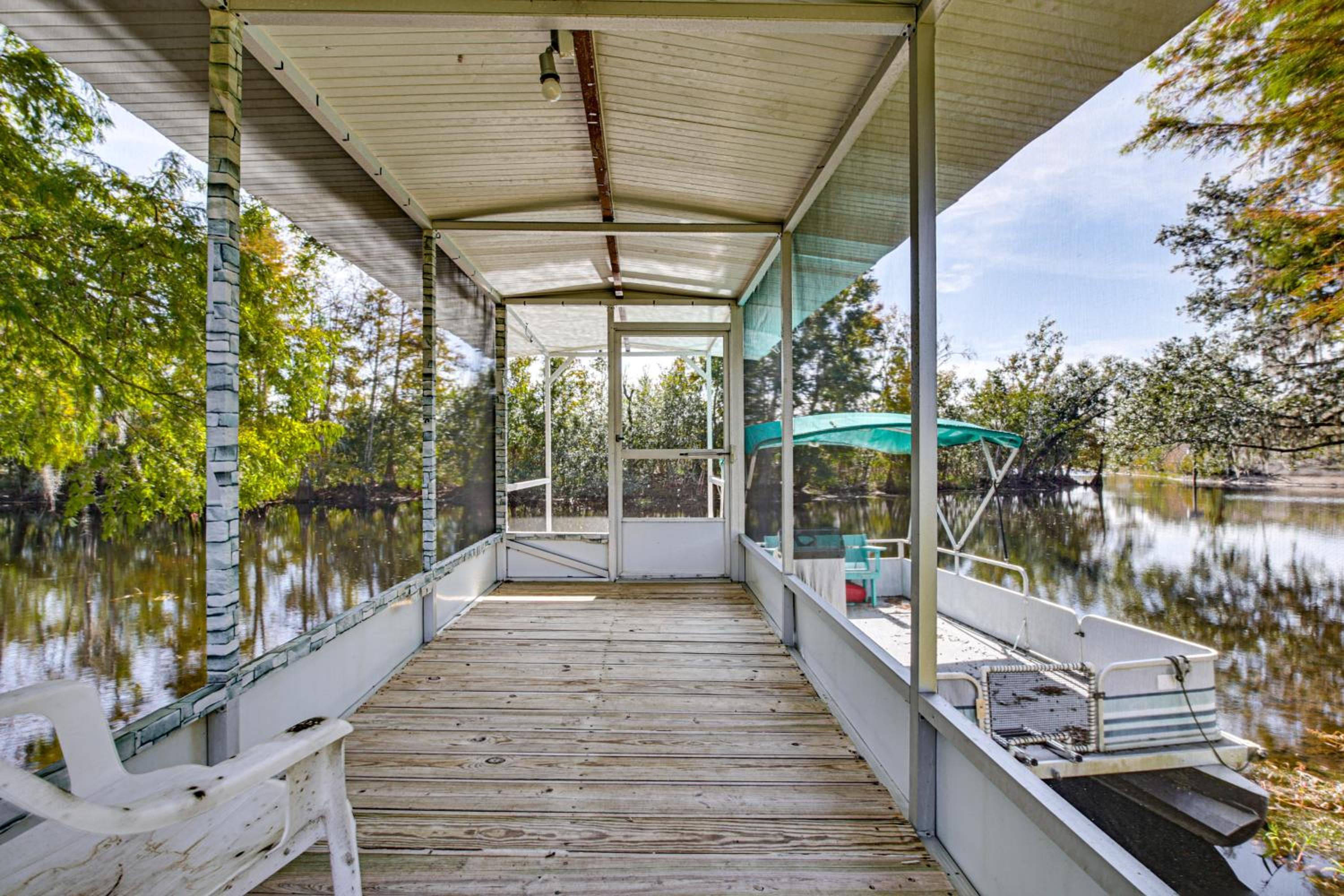 Riverfront Floral City Stay with Dock and Hot Tub!