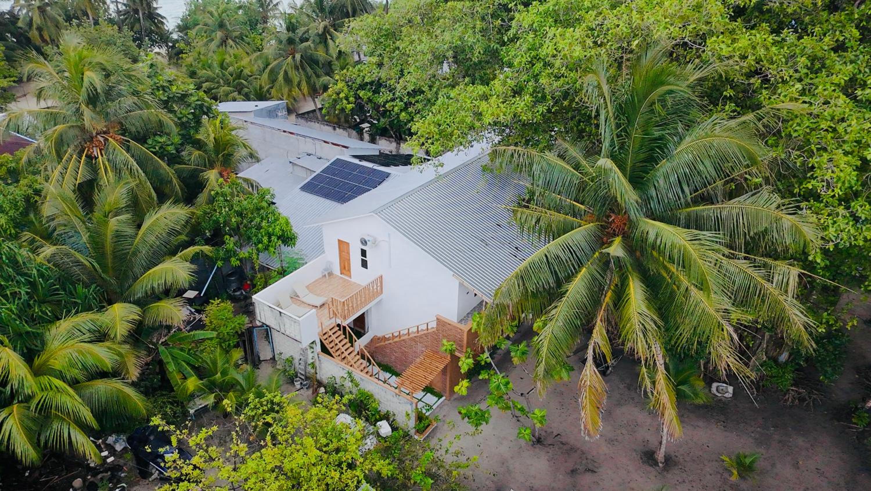 Eco Palm Mathiveri - Guest House with Complimentary Shared Kitchen & Laundry