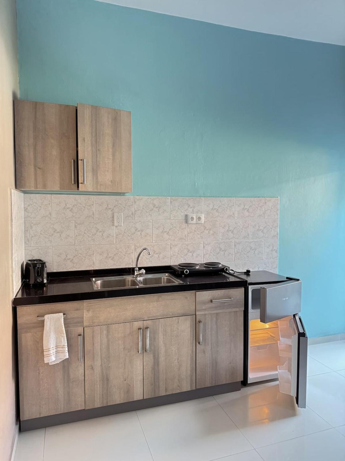 Cosy Guacamaya Azul, Otrobanda
