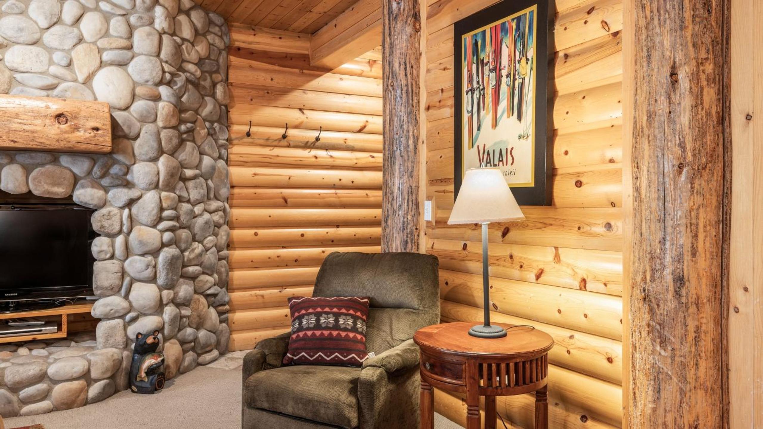 Mountain Charm Stone Fireplace Chefs Kitchen Balcony Cedar Ridge by AvantStay