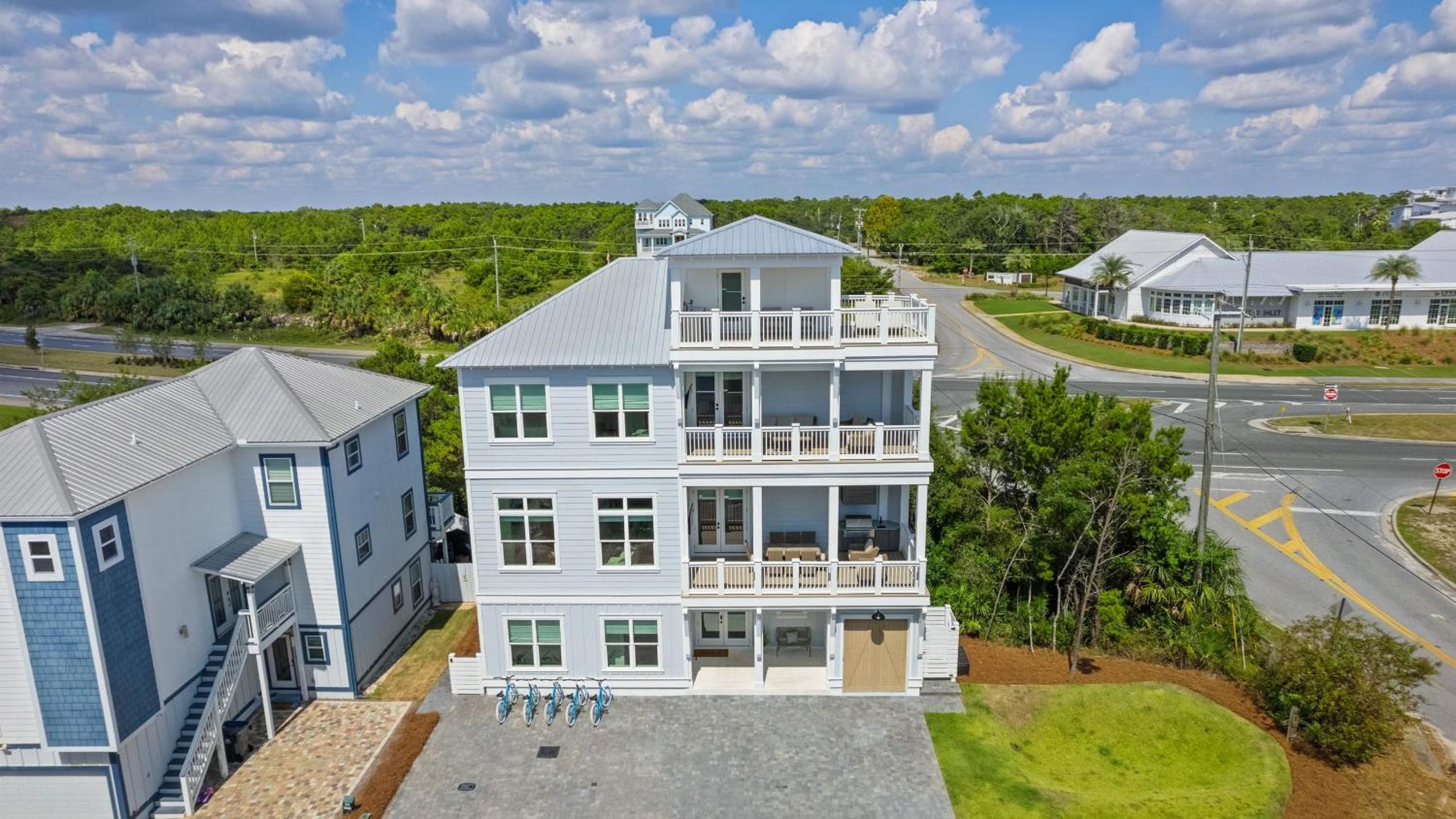 Spacious Coastal Retreat Near Inlet Beach with Bikes Balconies Modern Design Bluewater View by Avantstay