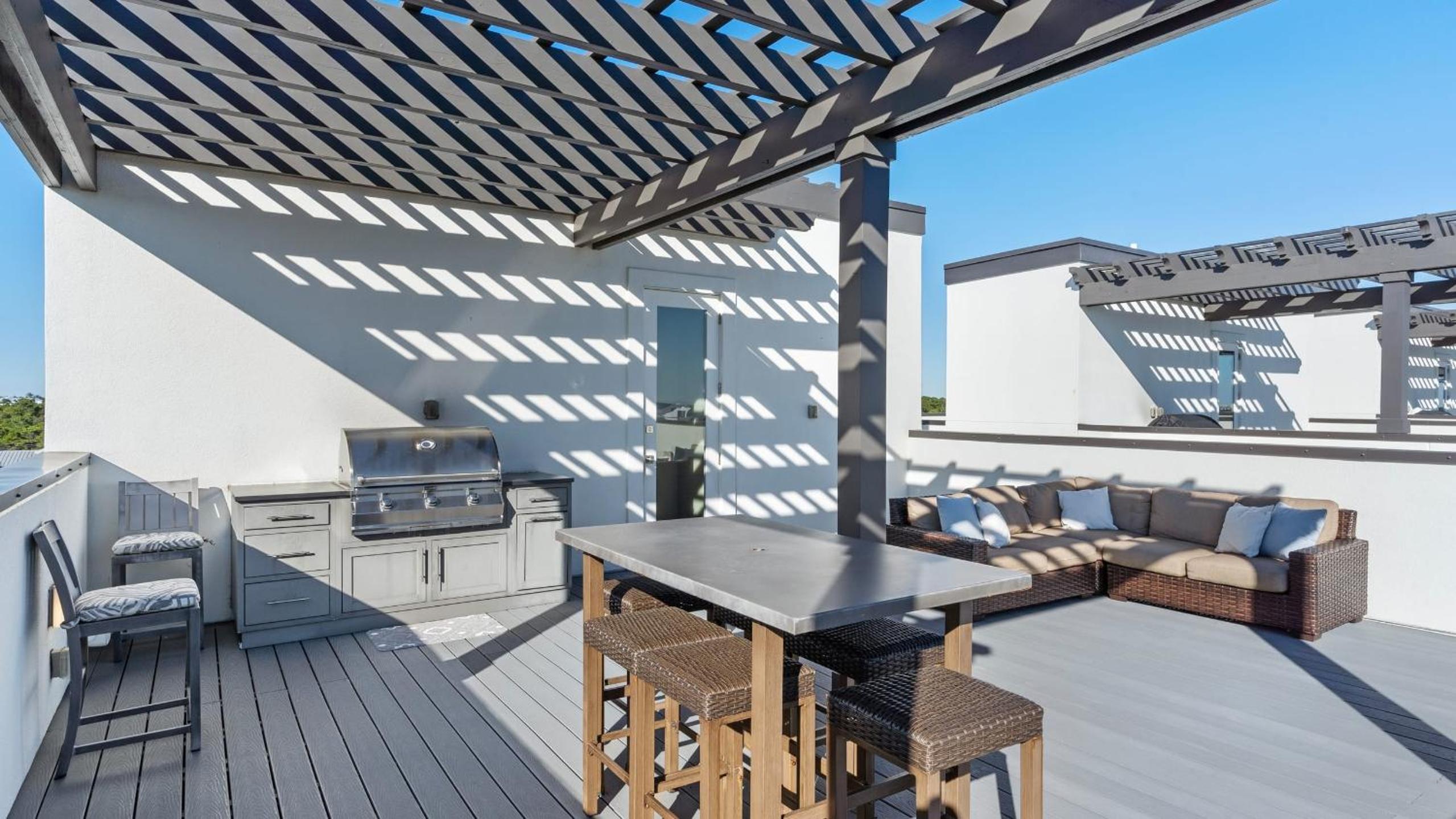 Rooftop Deck w Gulf Views Game Room Modern 30A by AvantStay