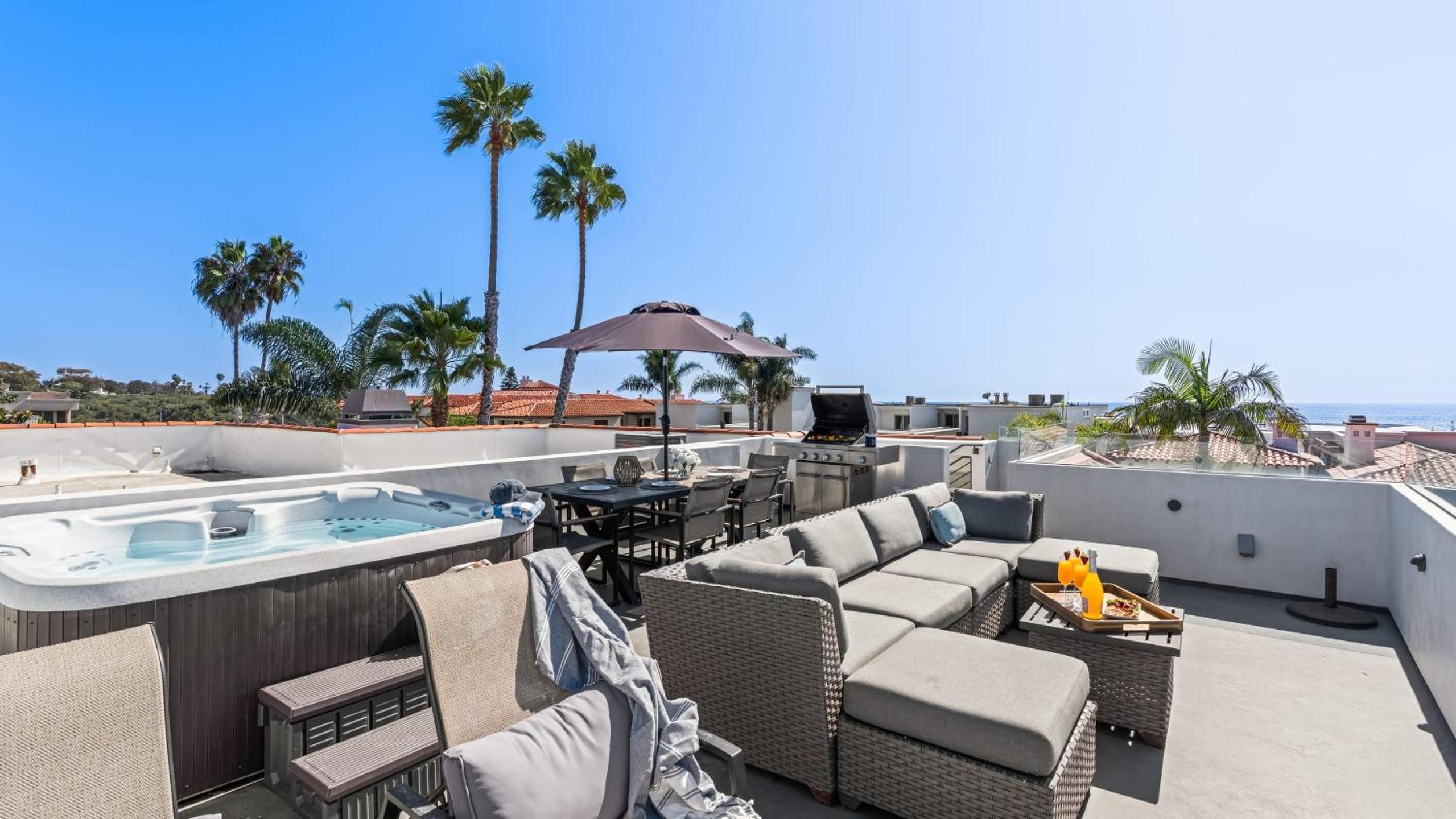 Rooftop w Hot Tub Firepit Ocean Views 259 Trailhead Trestles 1 by AvantStay