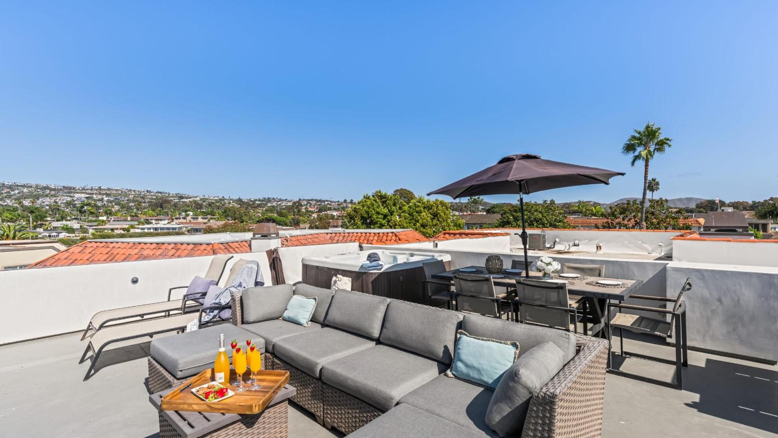 Rooftop w Hot Tub Firepit Ocean Views 259 Trailhead Trestles 1 by AvantStay