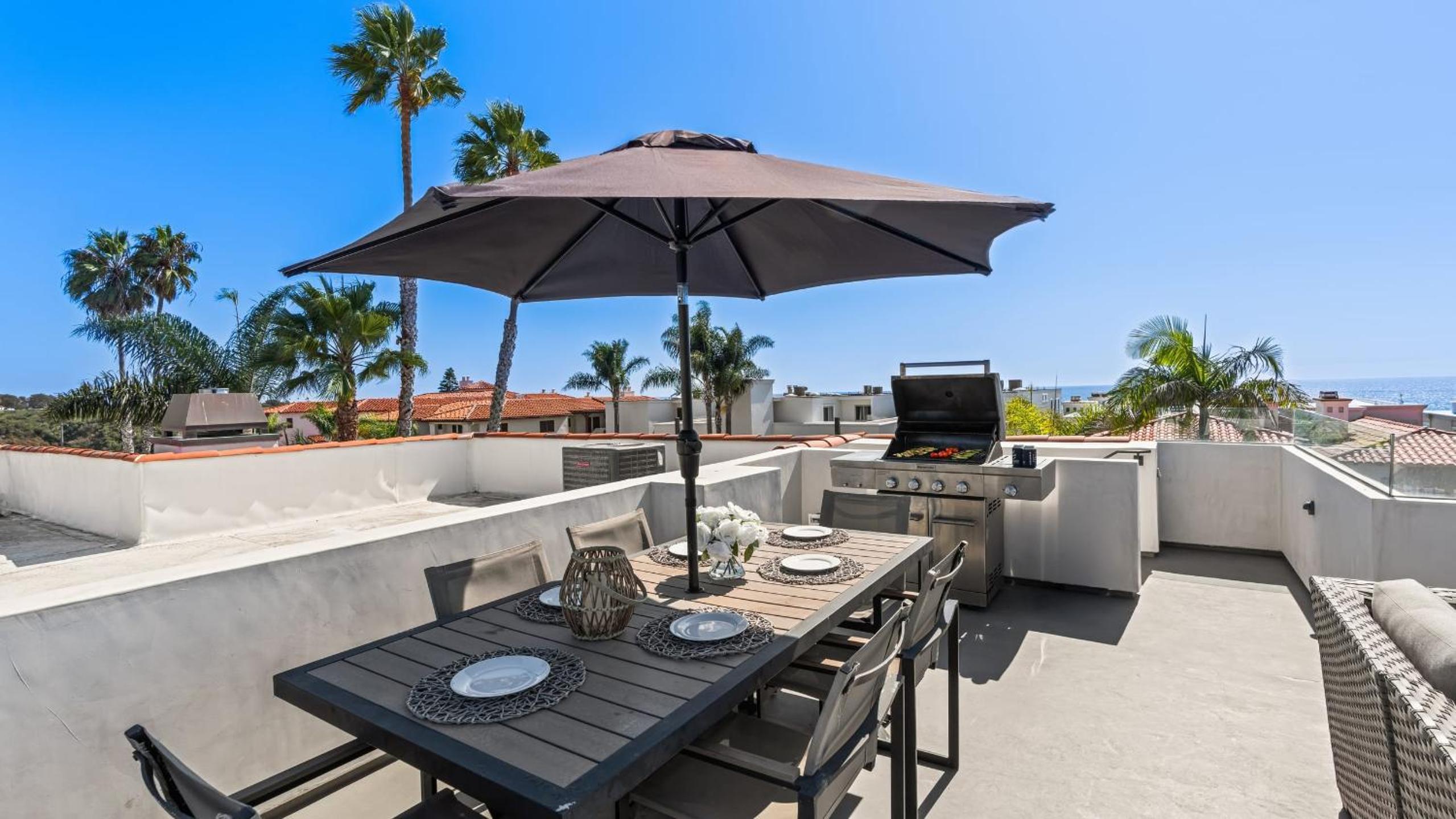 Rooftop w Hot Tub Firepit Ocean Views 259 Trailhead Trestles 1 by AvantStay