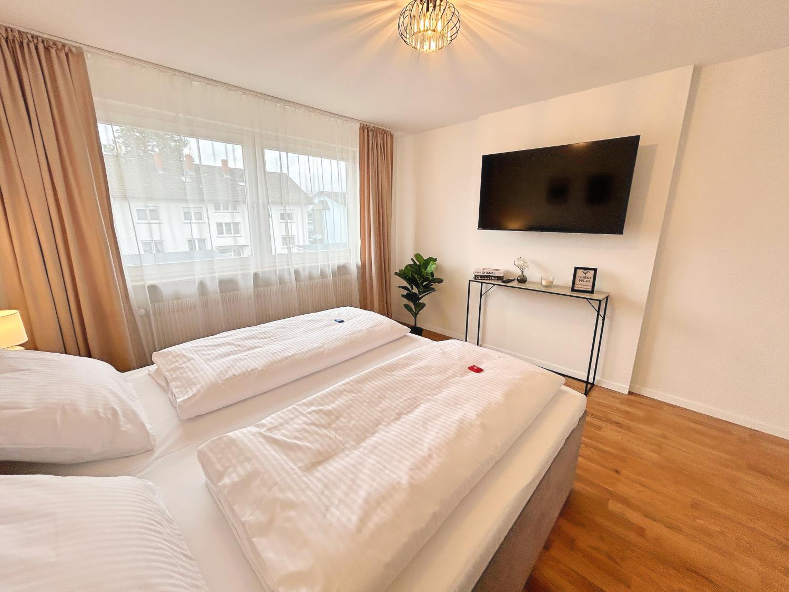 Basilisk Homes - in Grenzach-Wyhlen bei Basel - 4 x Moderne Fewos je 1bis2, 1bis4 oder 1bis6 Pers mit Küche und Balkon oder Terrasse - Parkplätze vorhanden